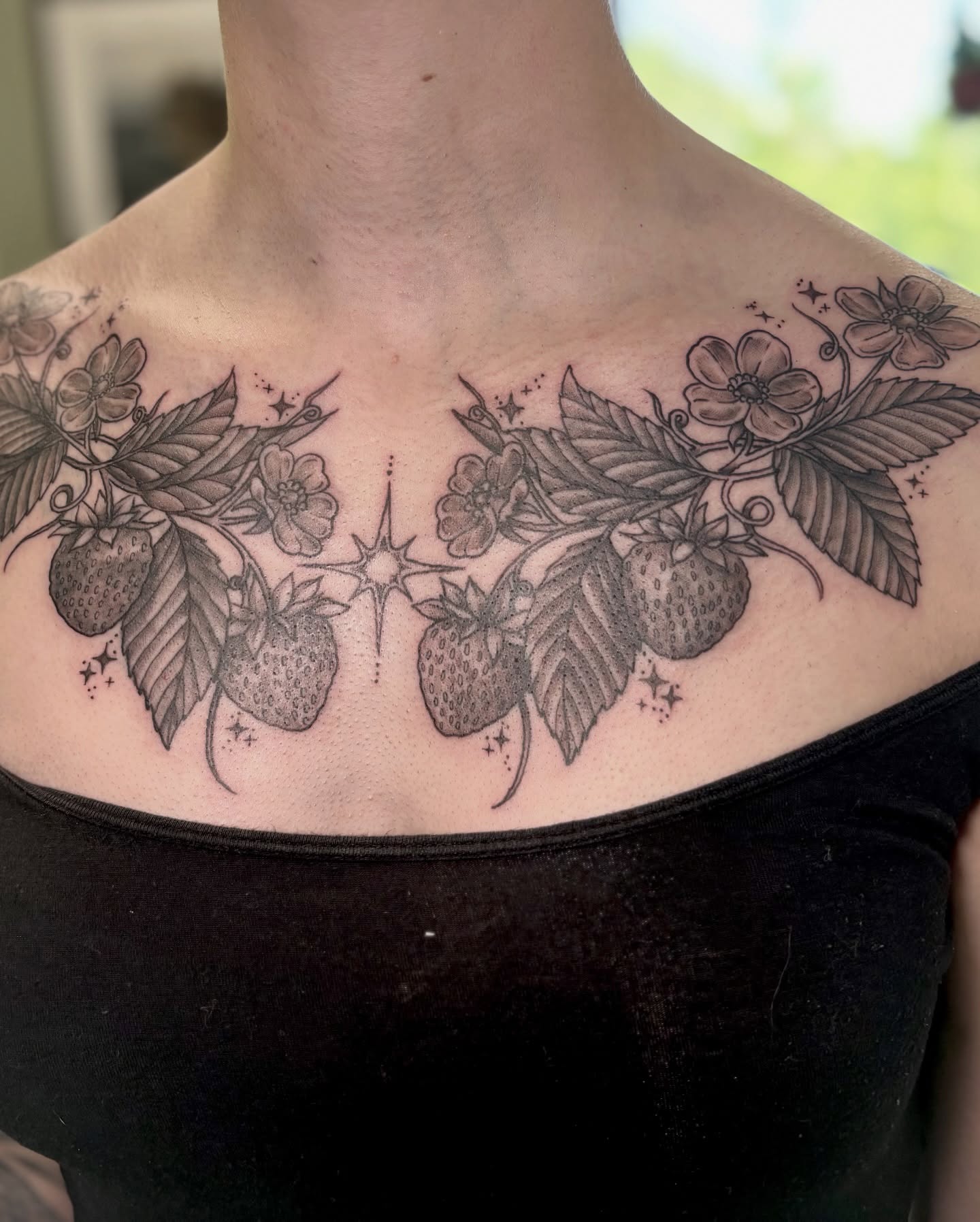 Strawberries and flowers realism tattoo on the chest by Sage Ray ♡