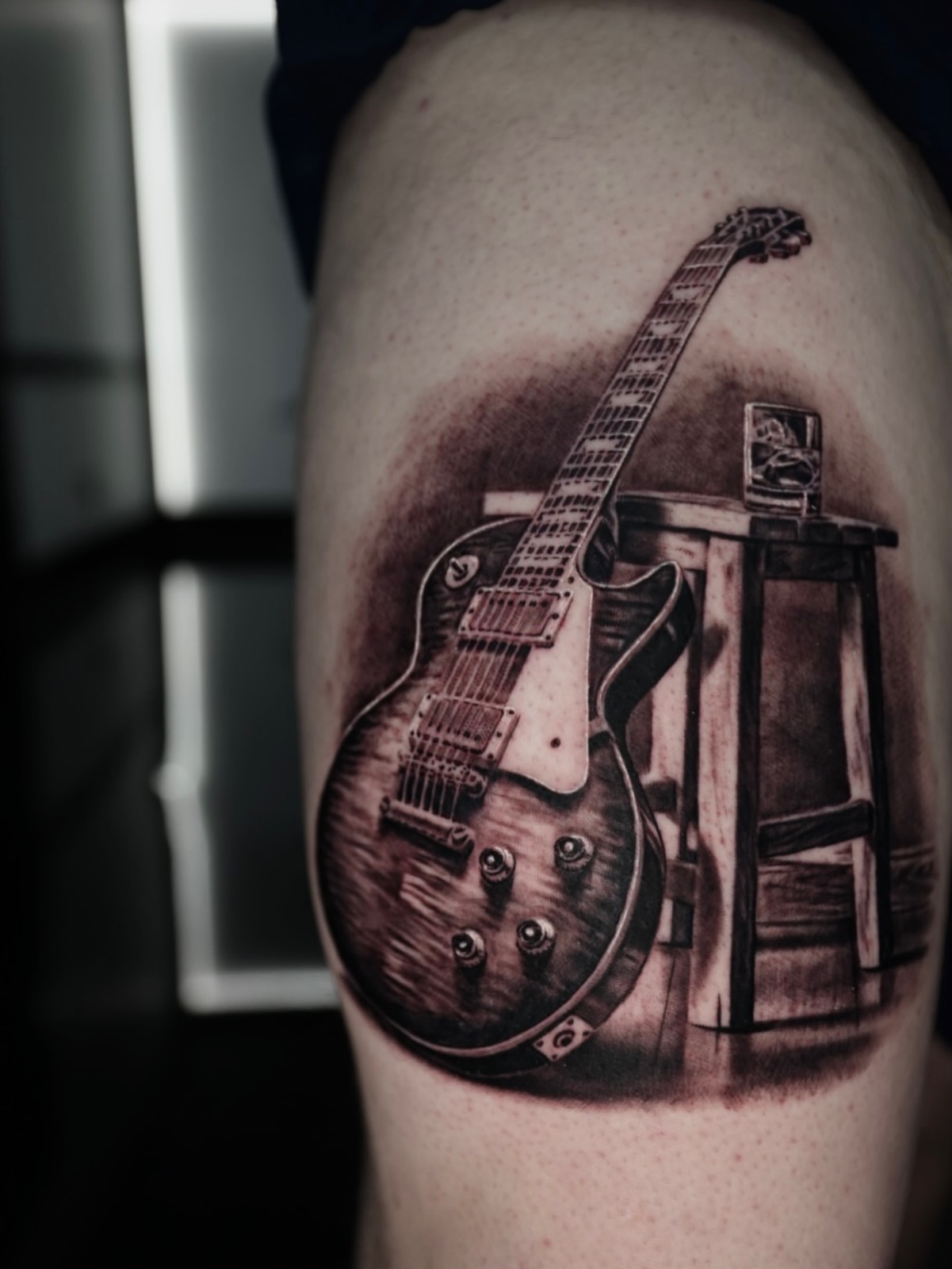 Electric guitar realism tattoo on the thigh by Matthew Brown, Londonderry, New Hampshire