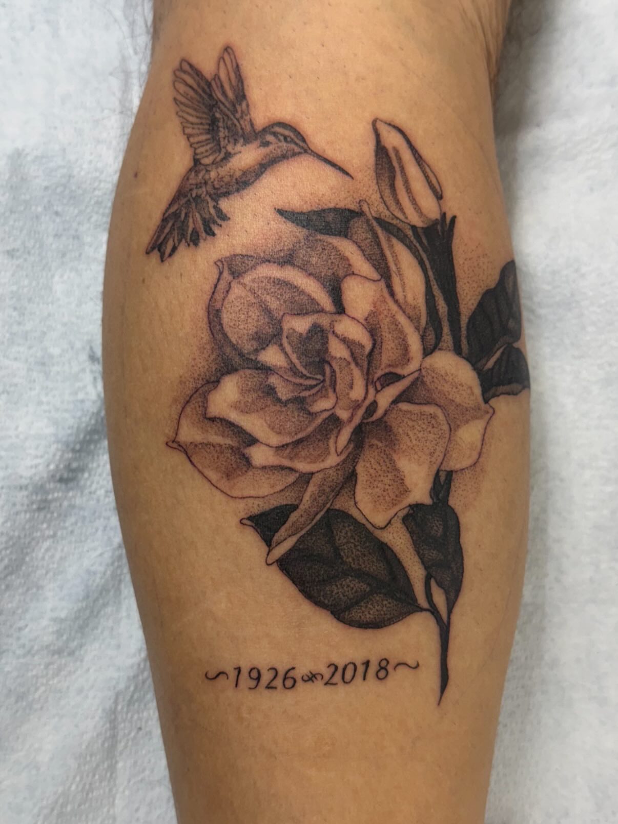 Rose and hummingbird dotwork tattoo on the forearm by Isabella π€