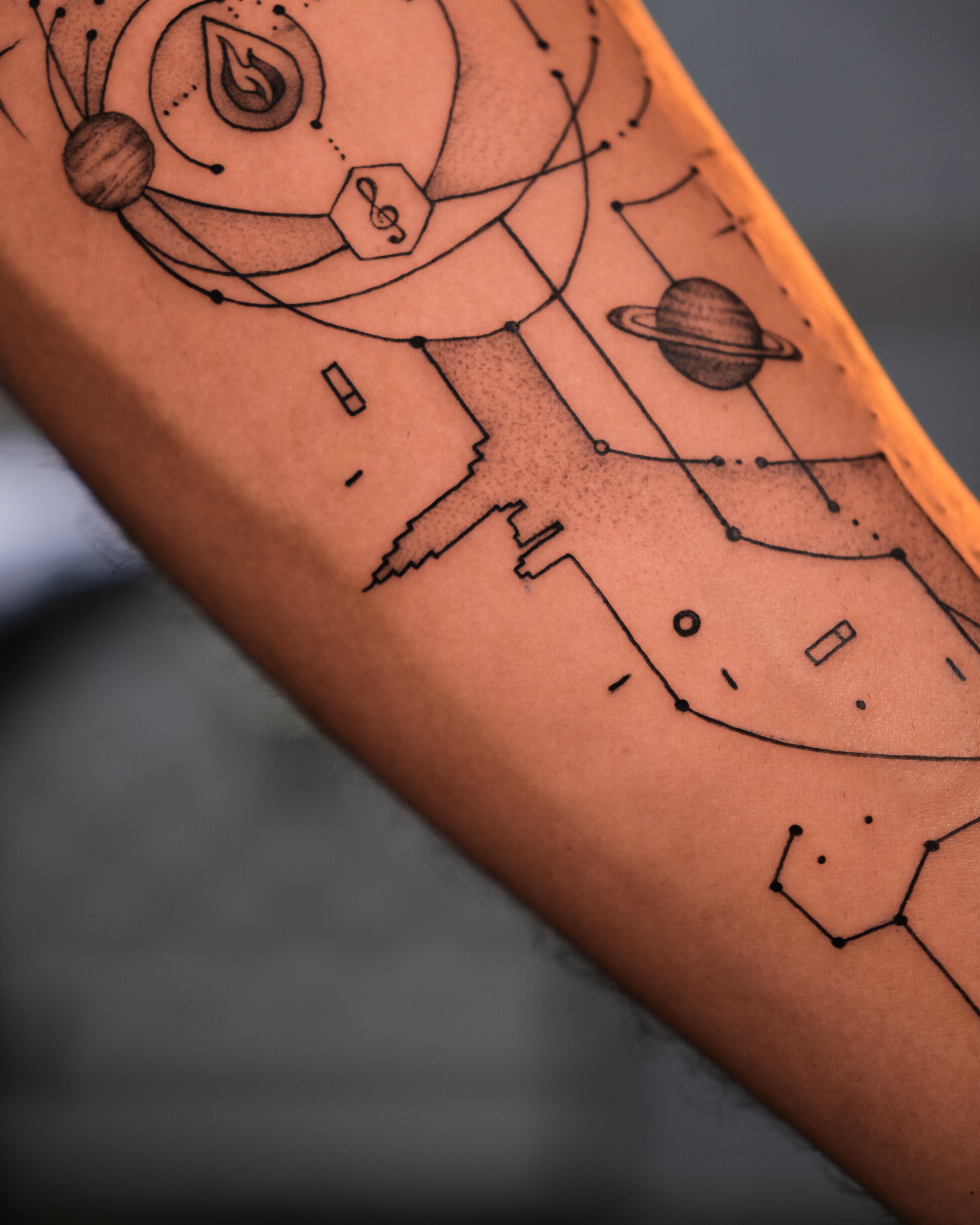 Astronomical symbols geometric tattoo on the forearm by Tattoo Miami π