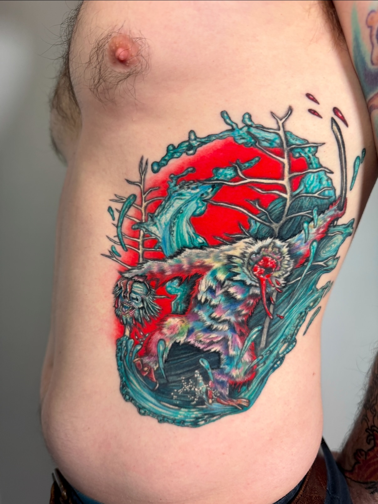 Monster in water dark realism tattoo on the ribs by aria, Austin, Texas