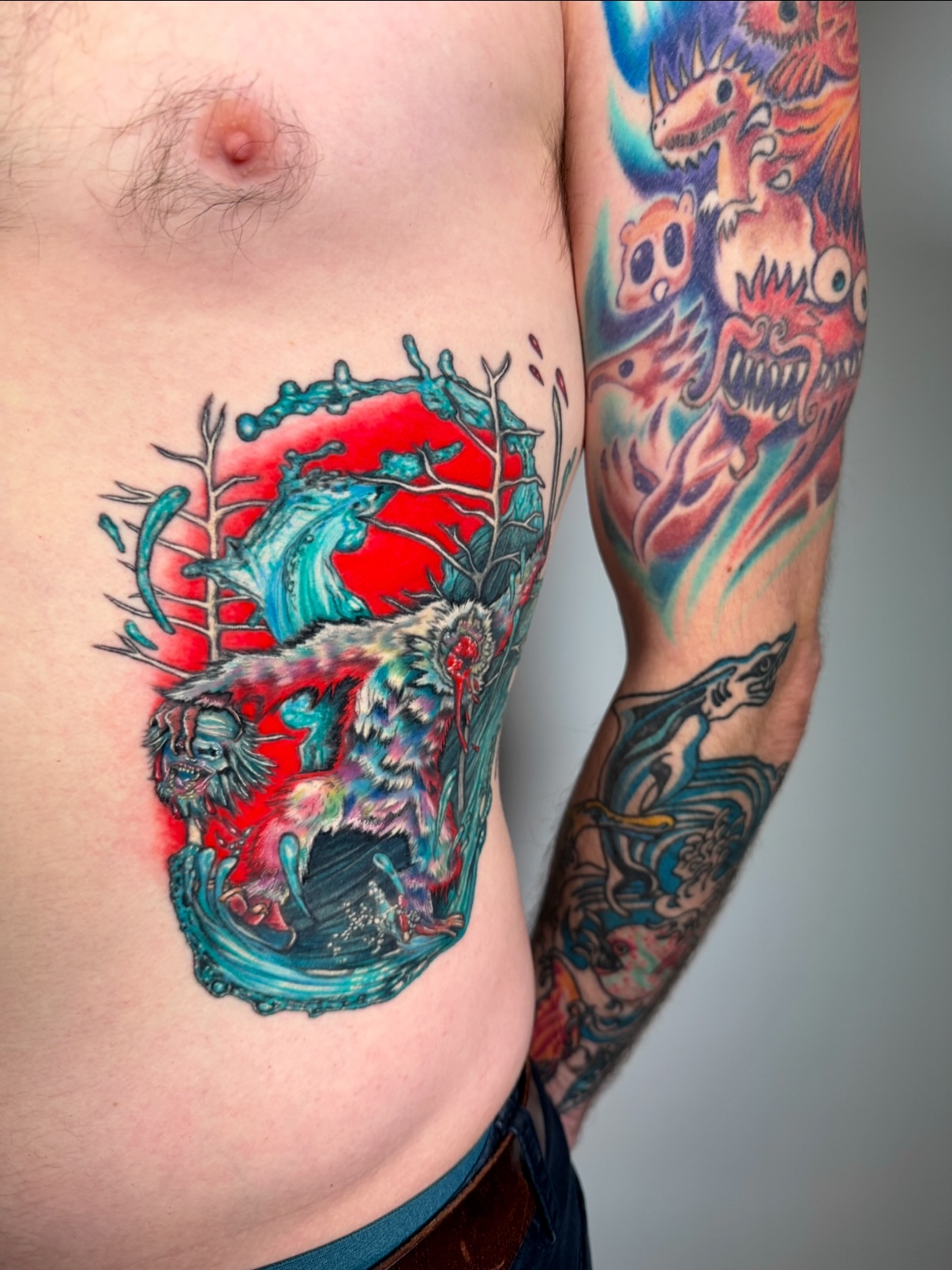Wolf and forest new school tattoo on the chest by aria, Austin, Texas