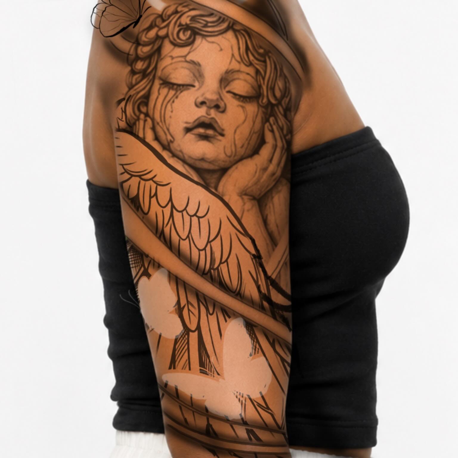Angel realism tattoo on the upper arm by D. Davis