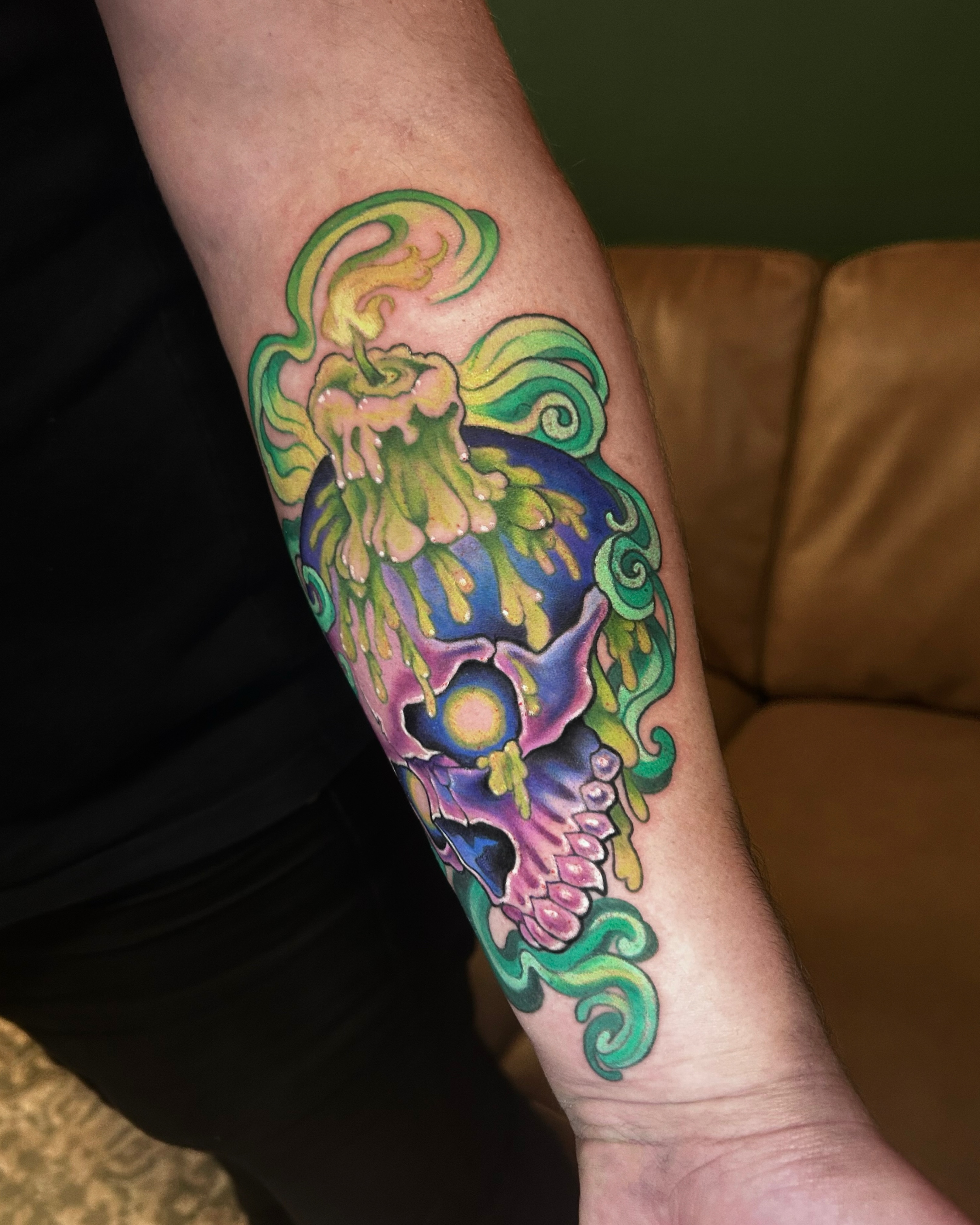 Psychedelic skull new school tattoo on the forearm by Zephyr