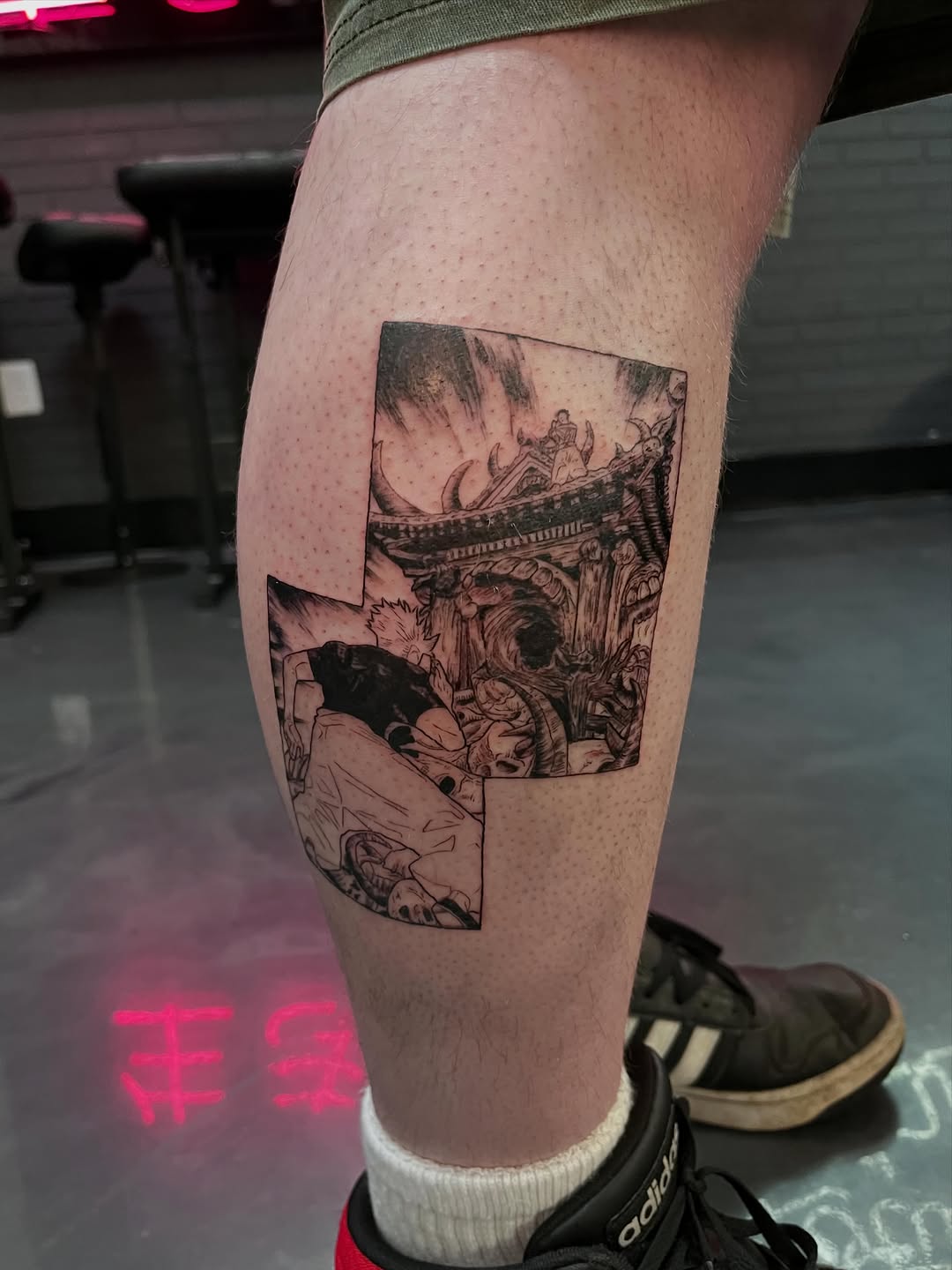 Manga panel scene anime tattoo on the calf by Bunny 🐰