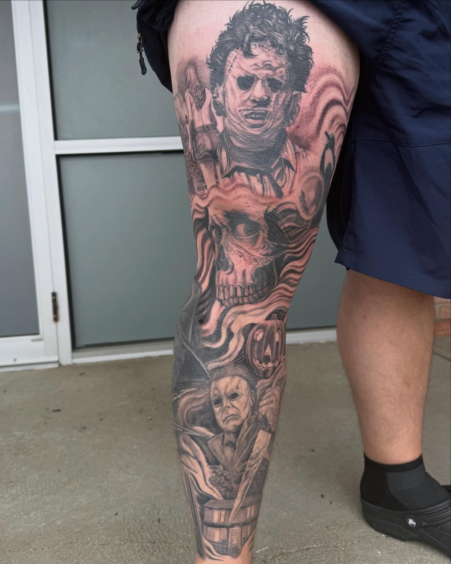 Horror movie characters realism tattoo on the thigh by Jesse Gray