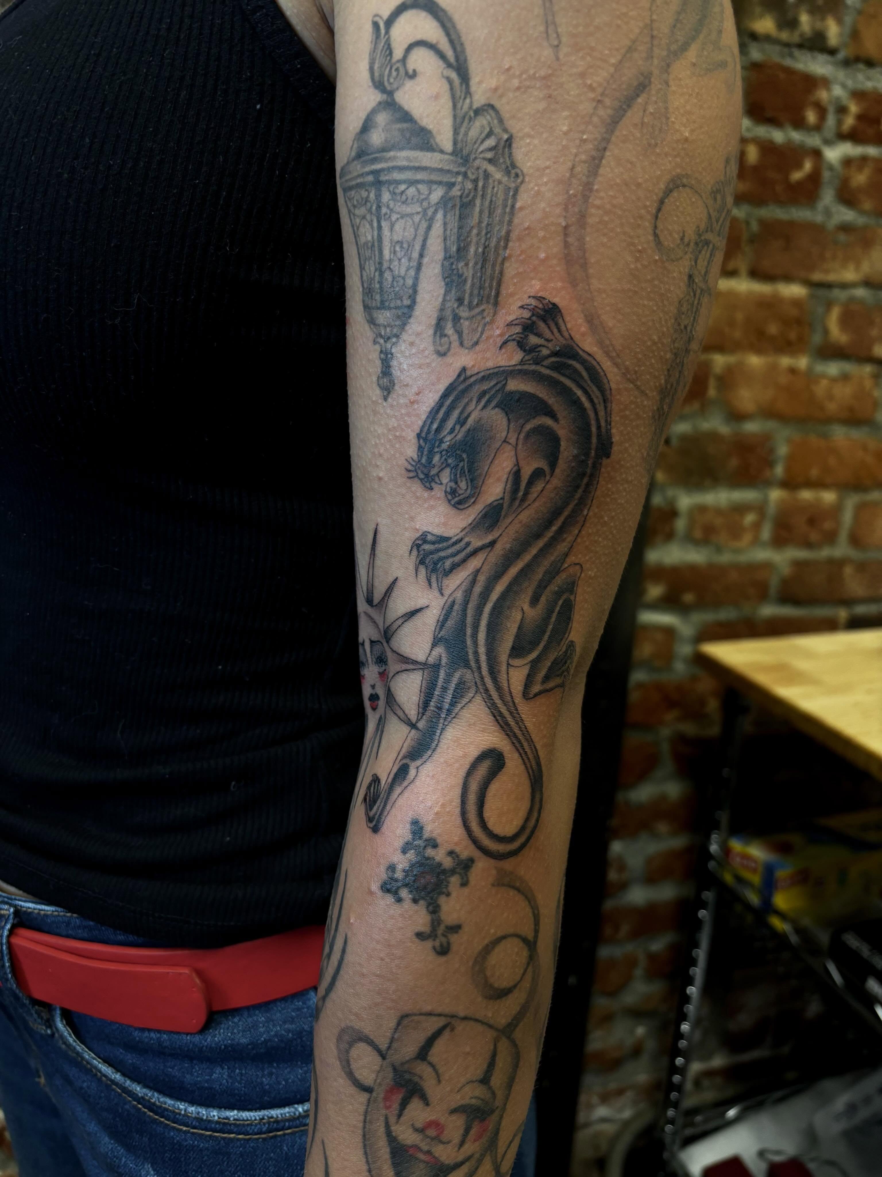 Dragon black and grey tattoo on the forearm by Alyssa L'Heureux🕴🏼, Los Angeles, California