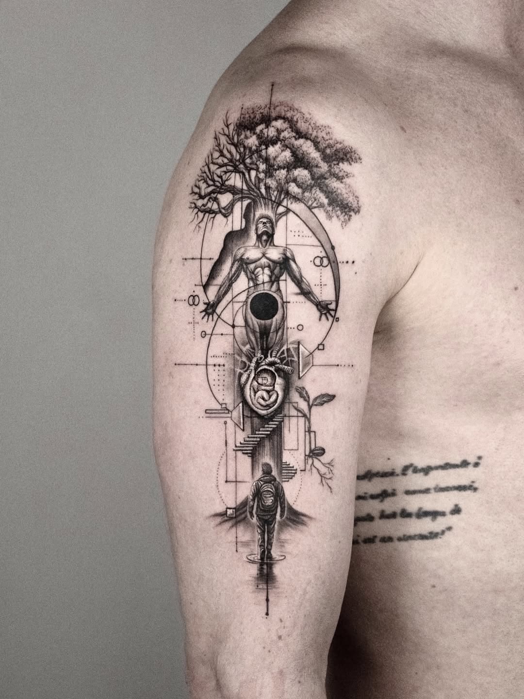Abstract surrealism surrealism tattoo on the upper arm by János Bozóki, Budapest, Hungary