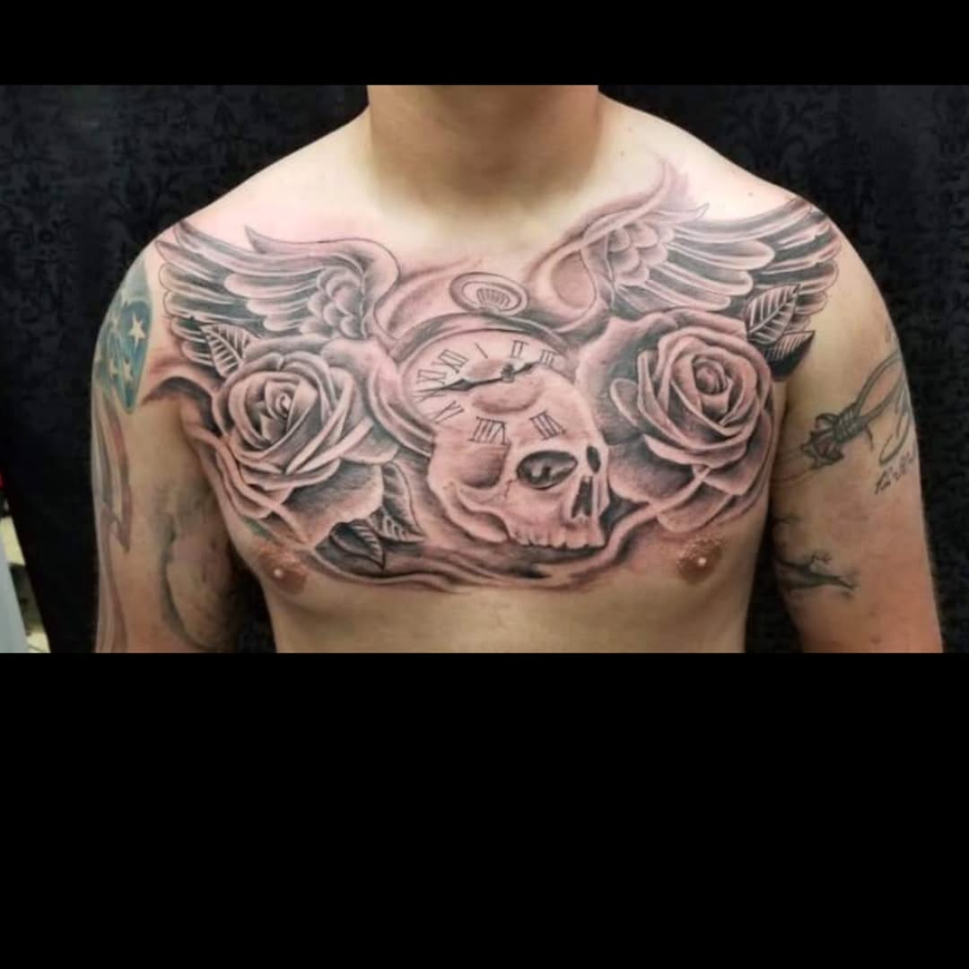 Realism tattoo on the chest by Dennis Foust