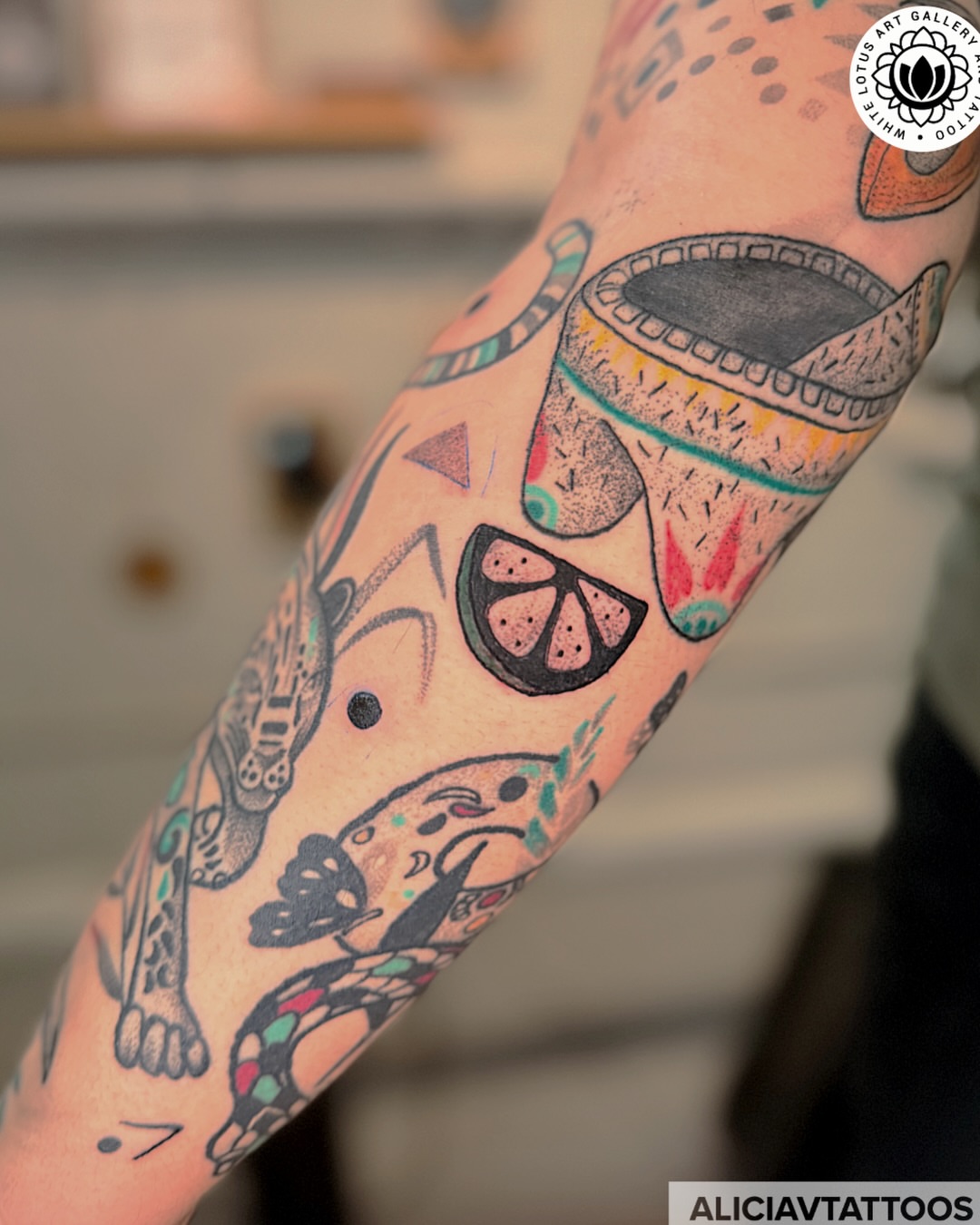 Day of the dead skull Chicano tattoo on the forearm by Alicia Vasquez