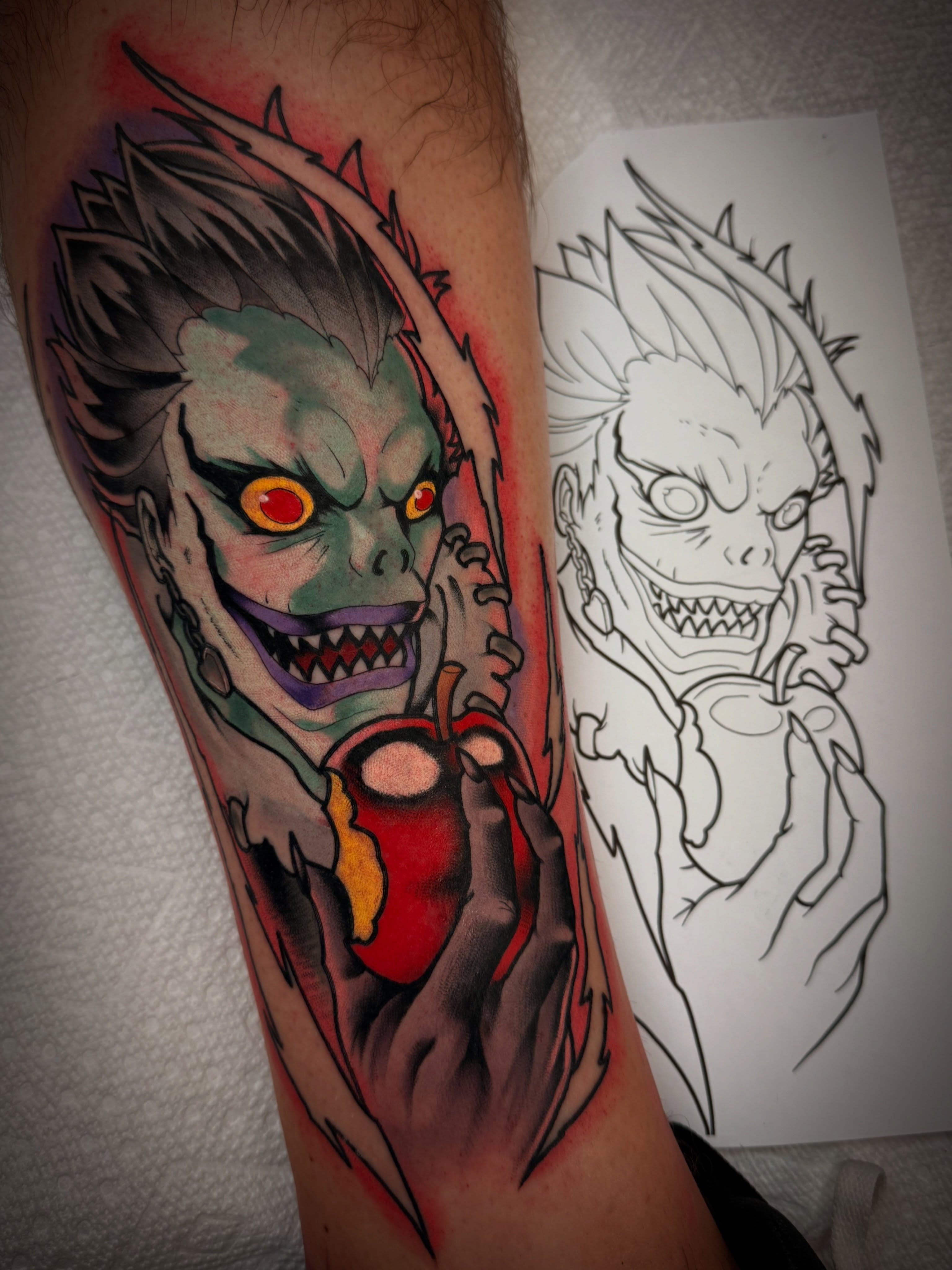 Joker character dark realism tattoo on the forearm by Dave Osrowitz