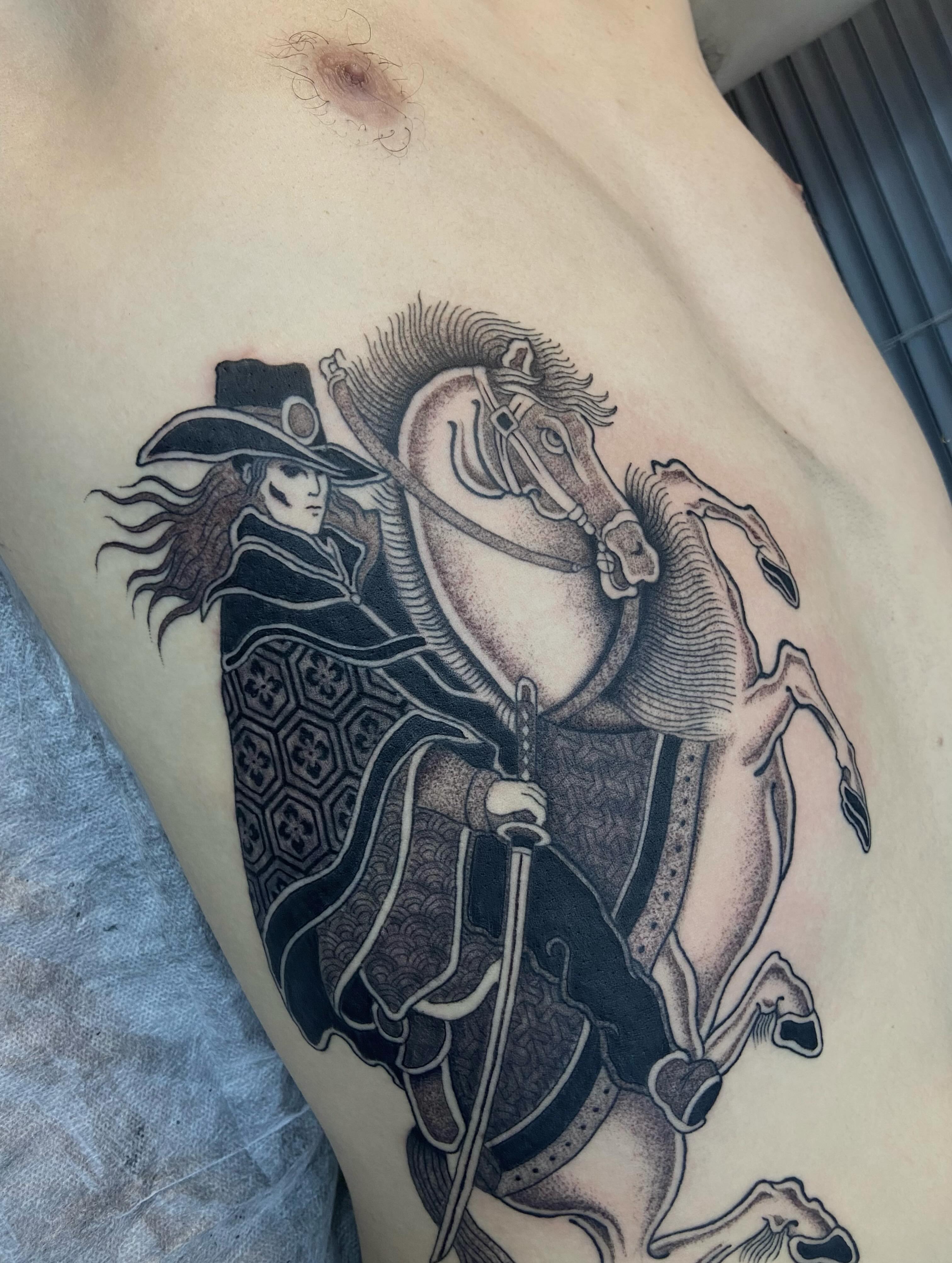 Samurai warrior on horseback realism tattoo on the thigh by Lucas Naganuma