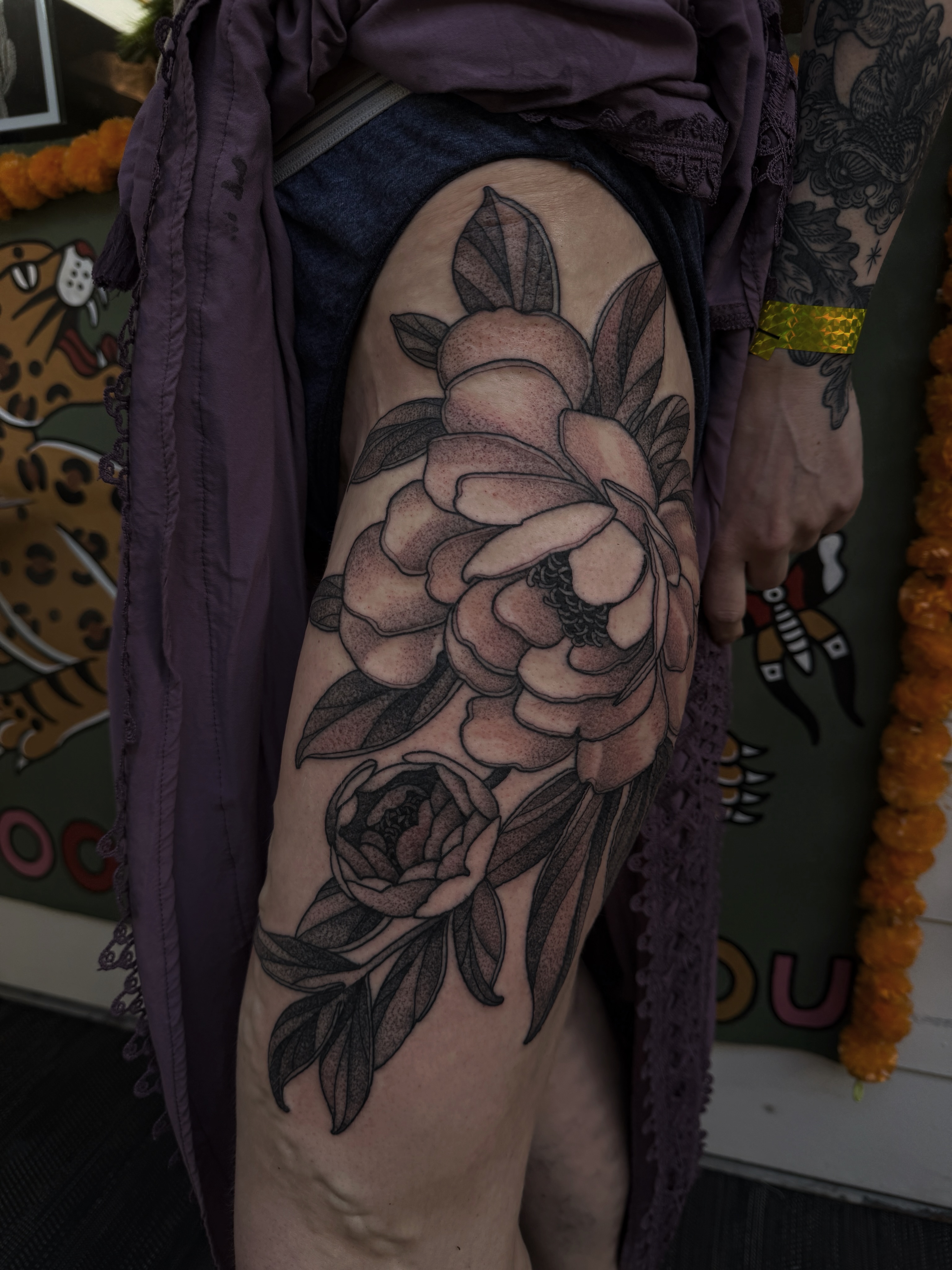 Peony black and grey tattoo on the thigh by gina