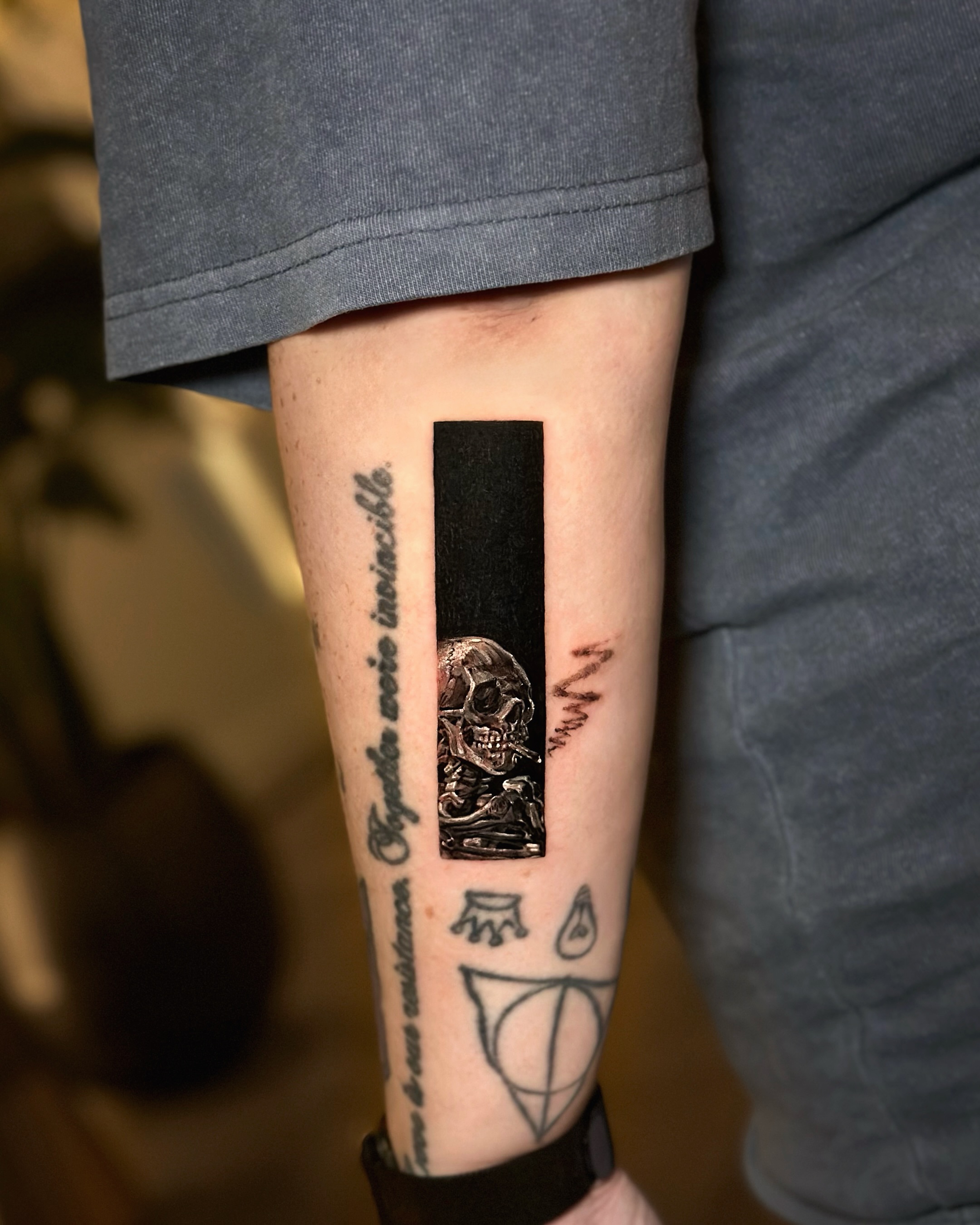 Skull and sword geometric tattoo on the forearm by Lani  라니