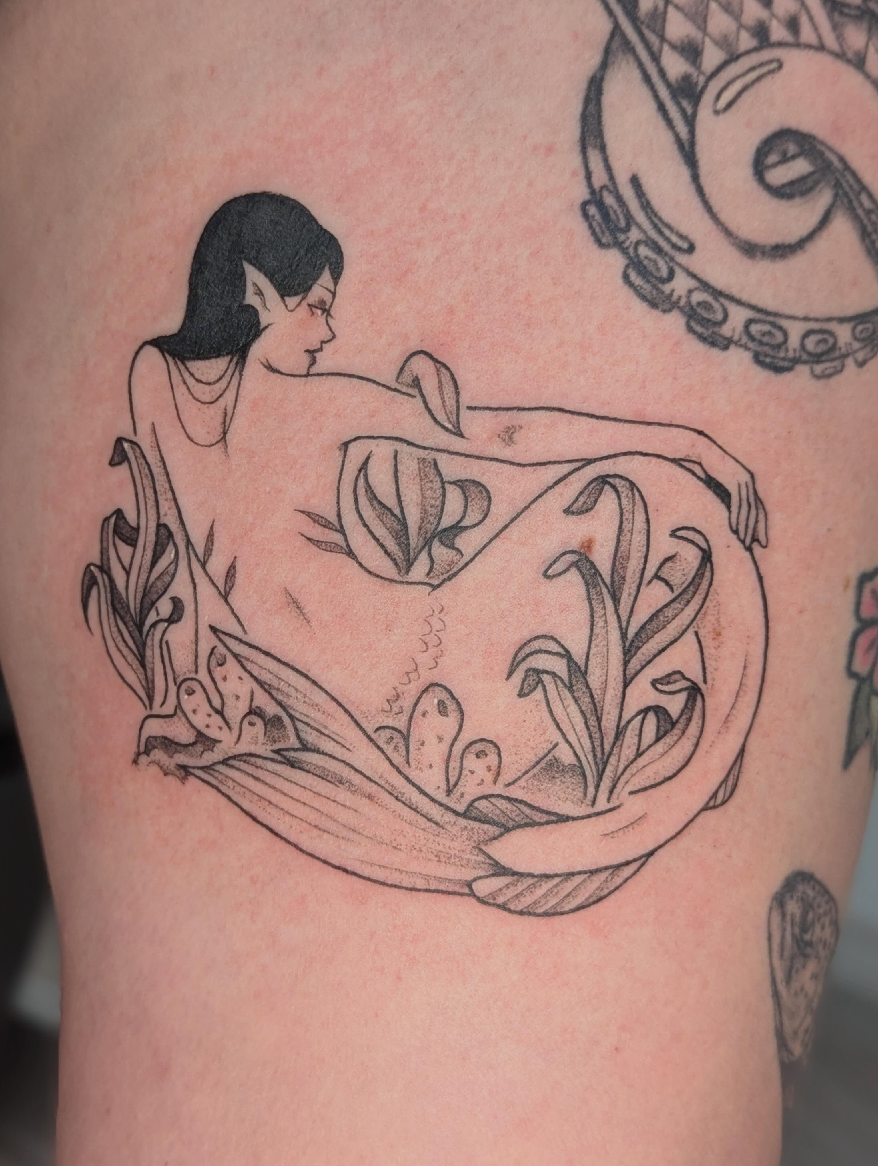 Mermaid black and grey tattoo on the thigh by Spencer Jennings, Westland, Michigan