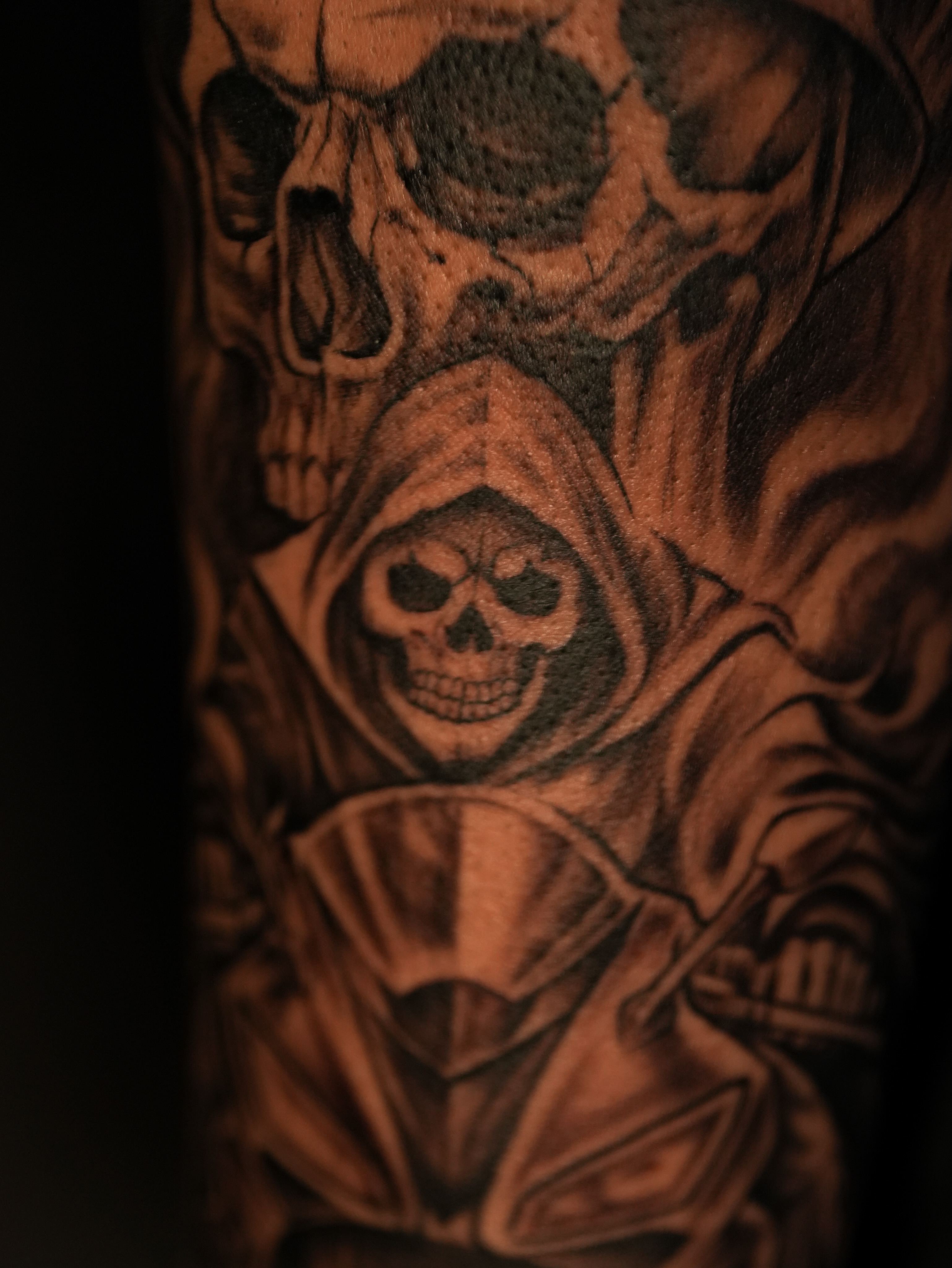 Reaper skull realism tattoo on the forearm by Kevin Betancourt