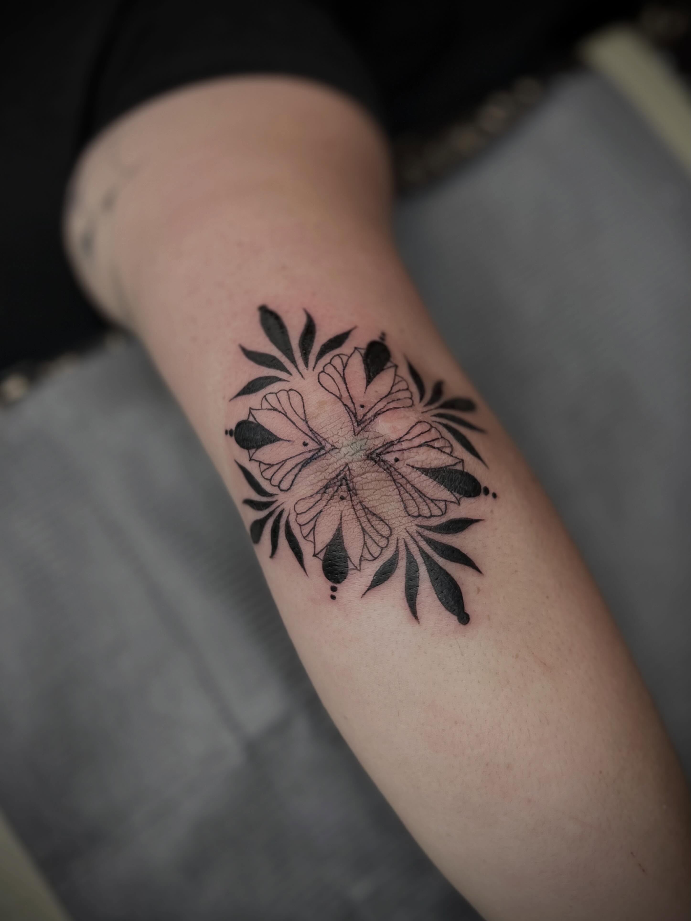 Flower black and grey tattoo on the forearm by Lexi Rose