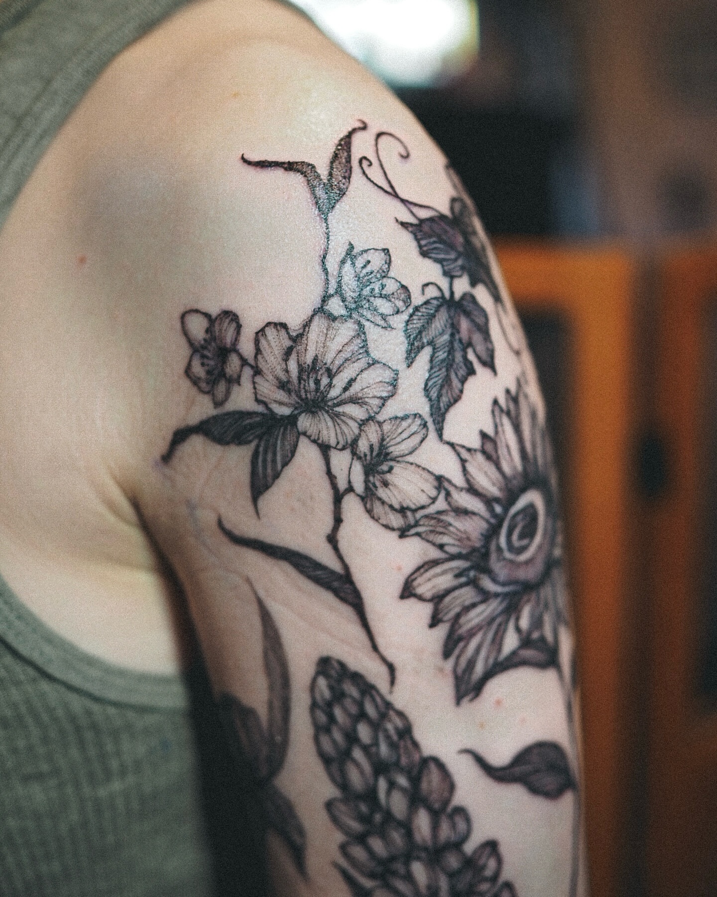 Floral arrangement realism tattoo on the shoulder by Inks by Nastia