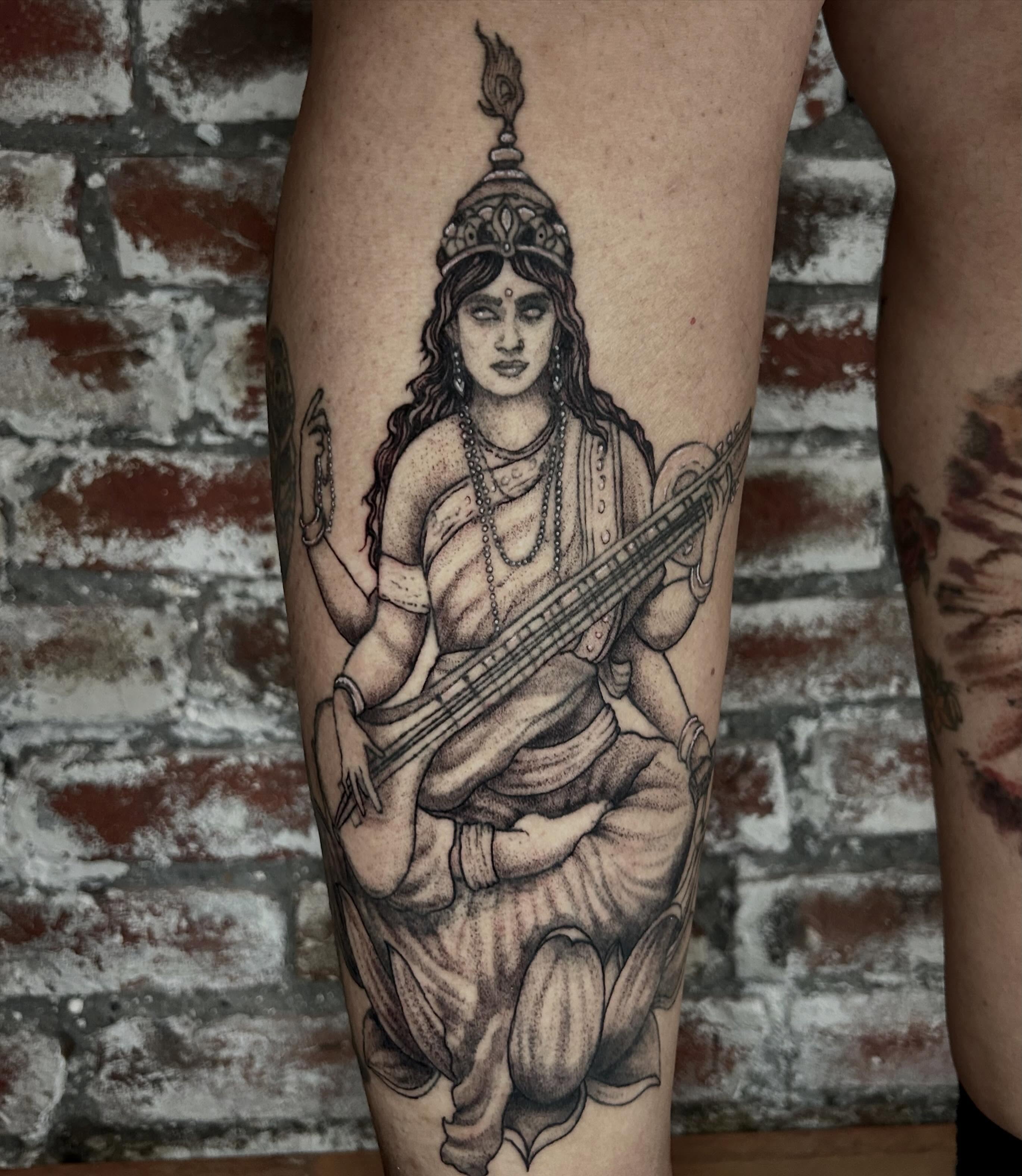 Sitar player dotwork tattoo on the thigh by ๐๐๐๐๐๐ ๐๐๐๐๐๐ ๐๐๐๐๐๐