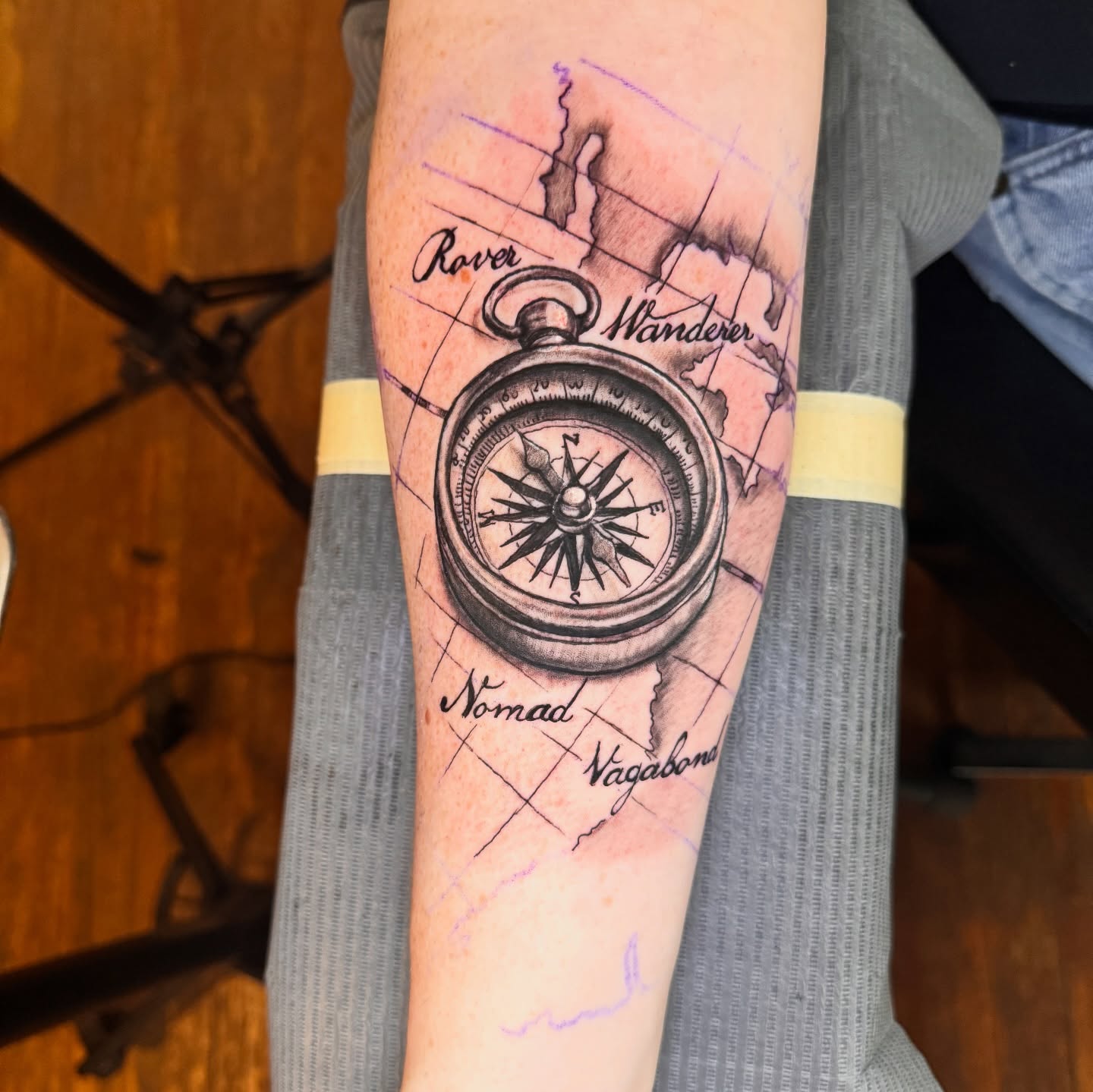 Compass black and grey tattoo on the forearm by Eric Burns - NoVA Tattoo Artist