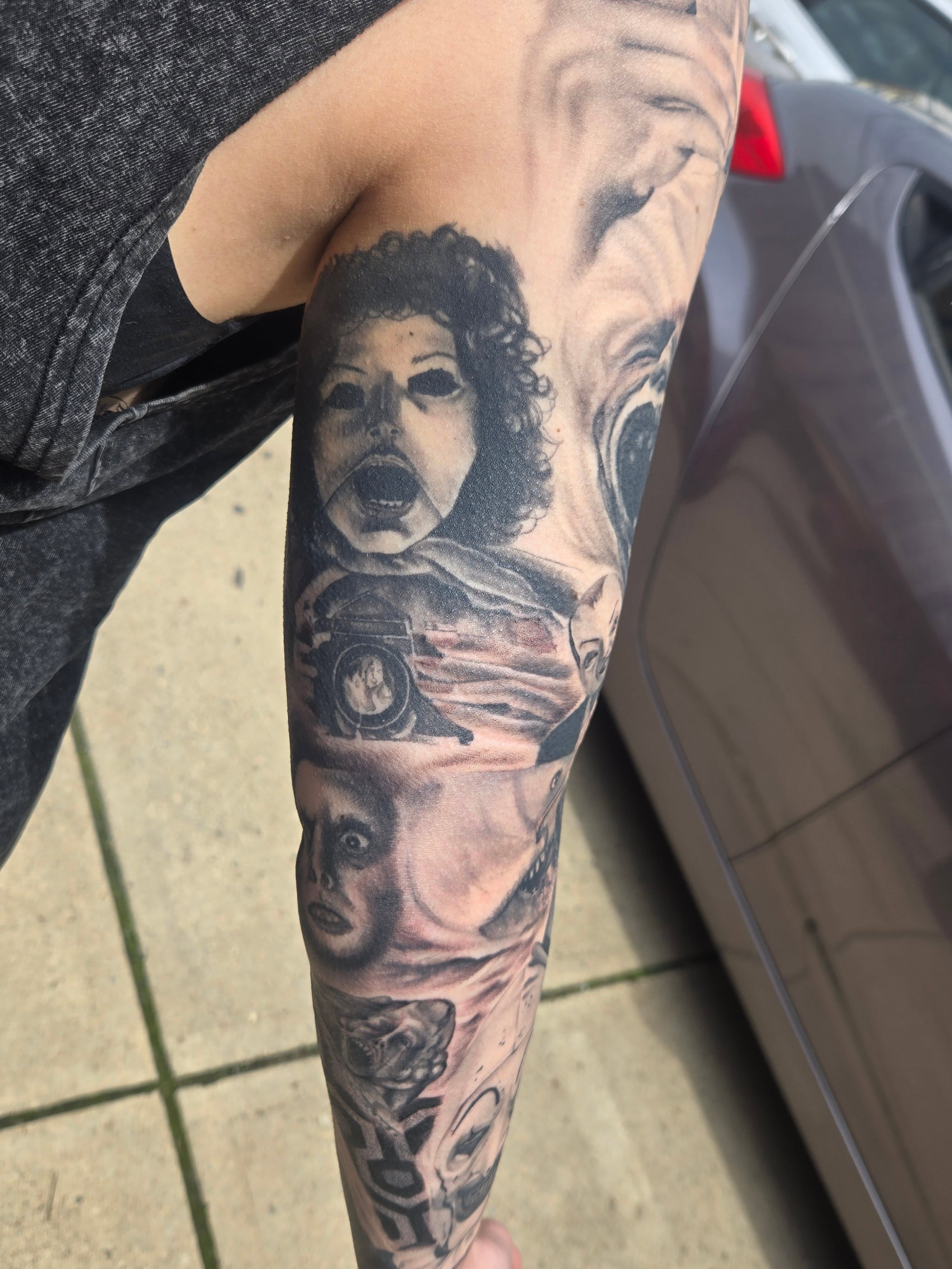 Child's face realism tattoo on the forearm by Angel O'Connor Tattoos