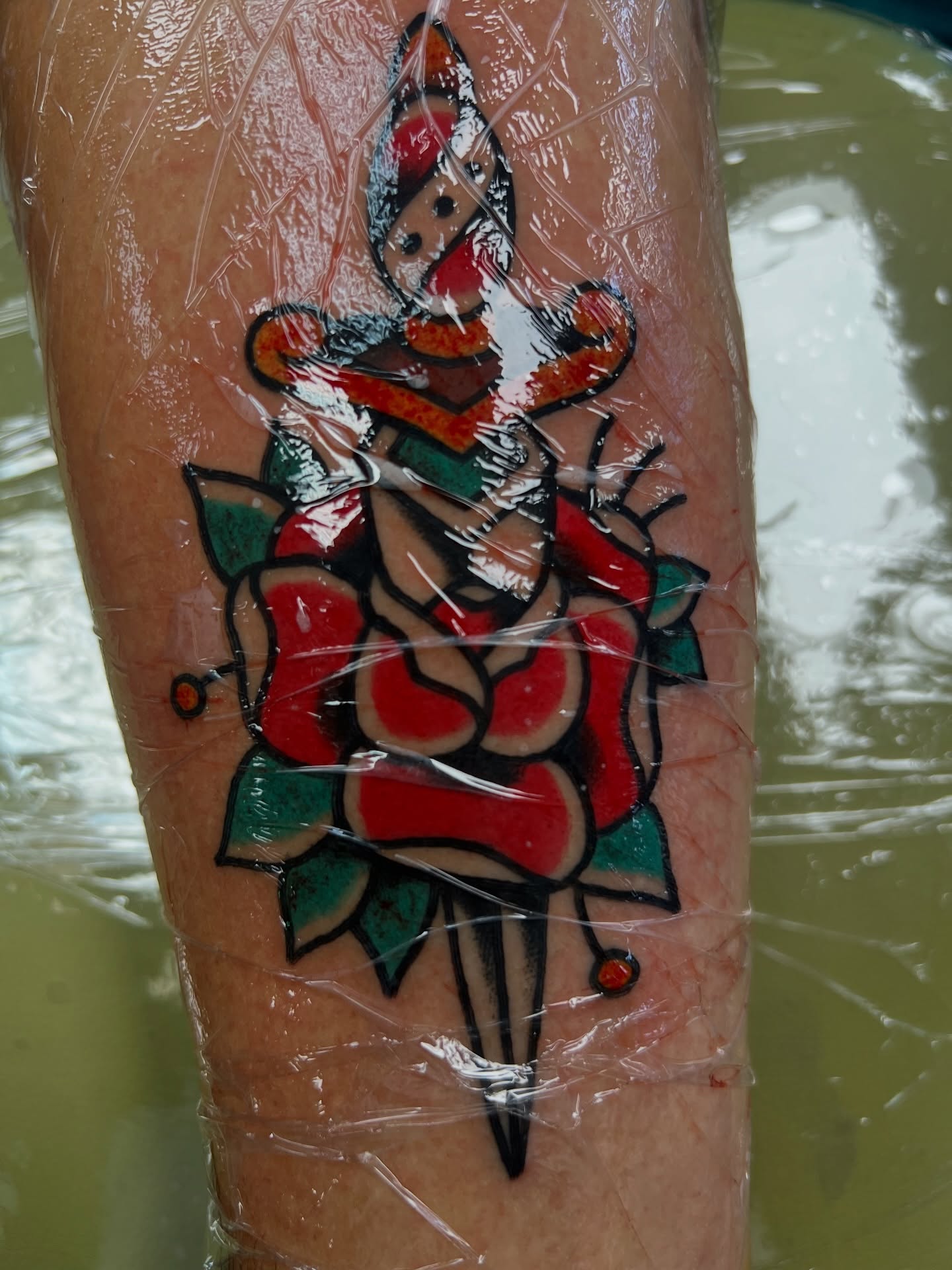 Jester American traditional tattoo on the forearm by 🍊Harvey Perez 🍊, Deerfield Beach, Florida