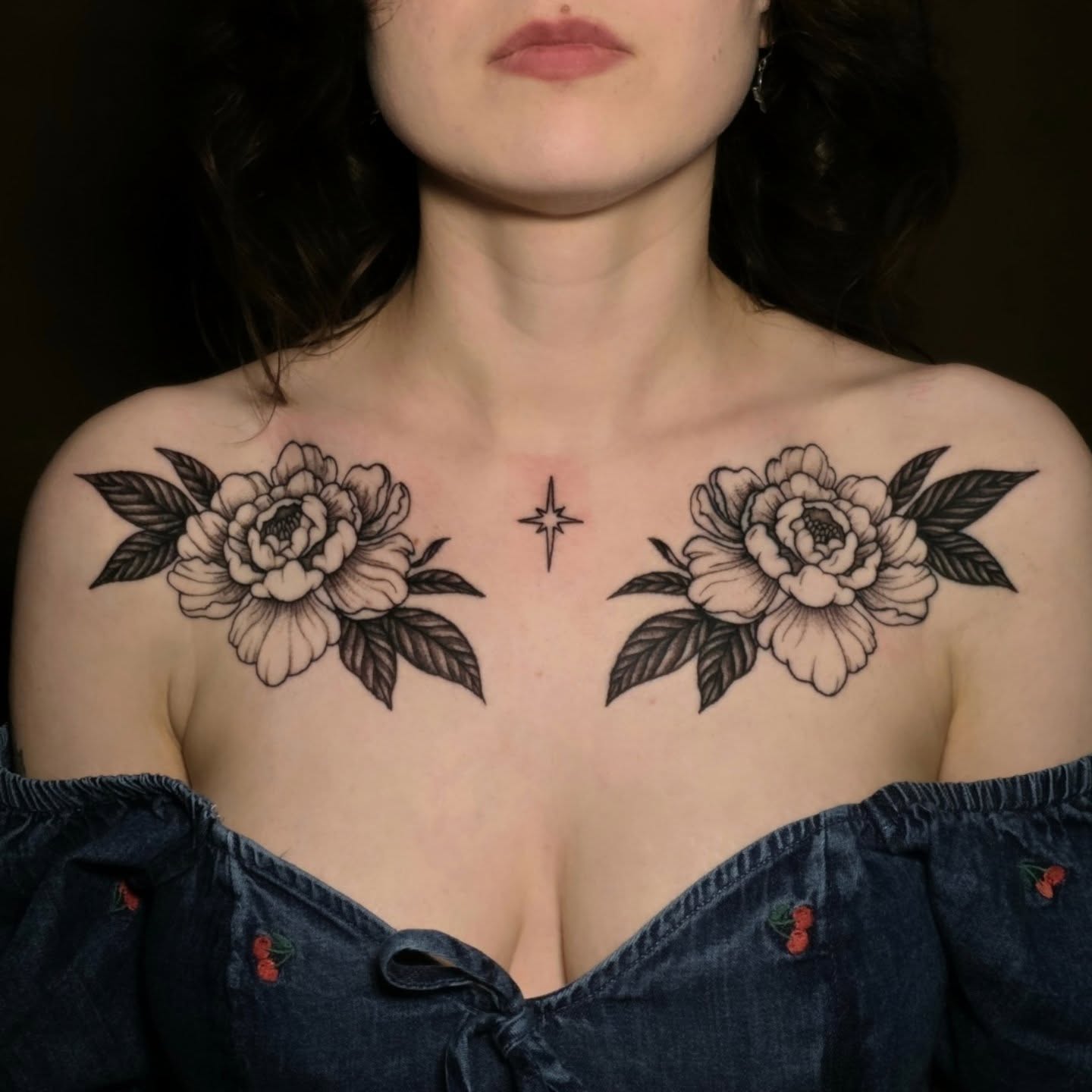 Peony flowers black and grey tattoo on the chest by Nick de Hoyos