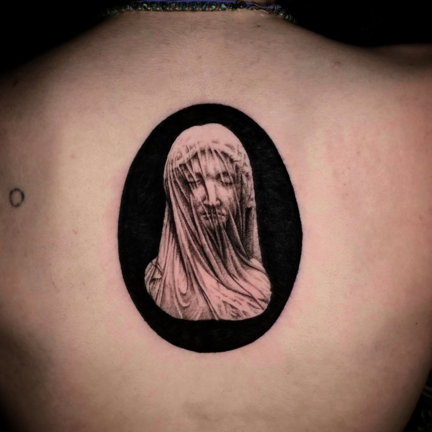 Veiled figure black and grey tattoo on the back by Nick de Hoyos