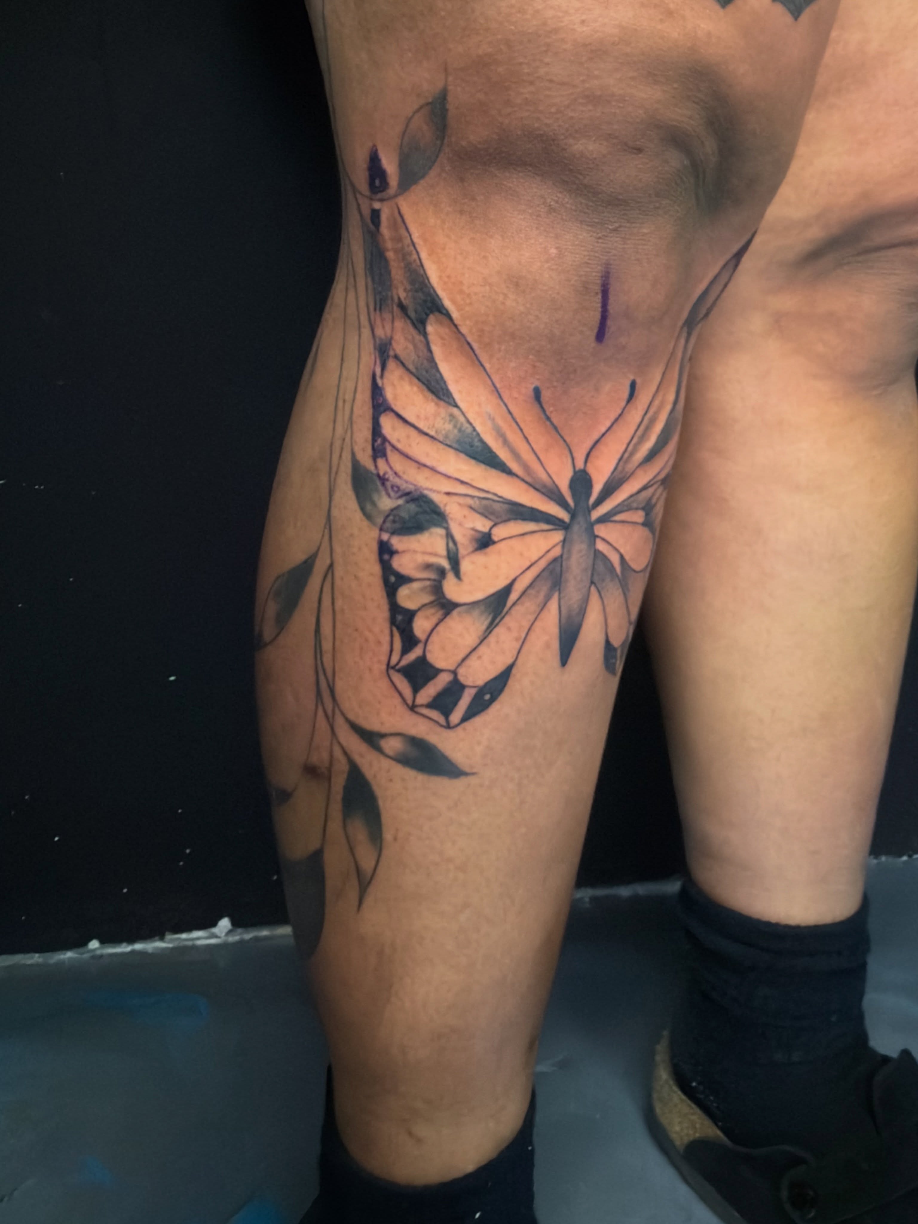 Butterfly black and grey tattoo on the calf by David Yancy III