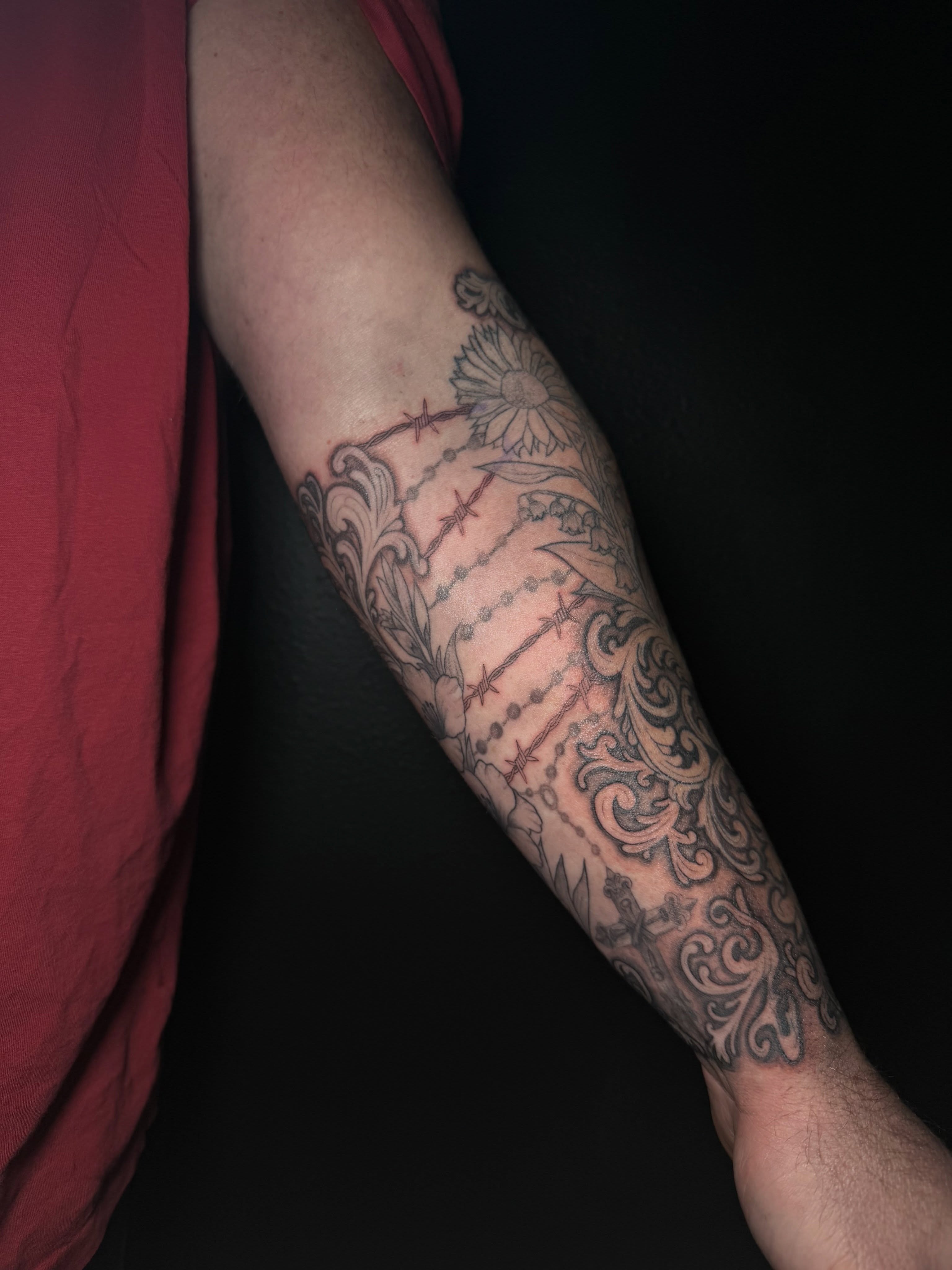 Floral and ornamental ornamental tattoo on the forearm by Ink Darling, Carlisle, Iowa