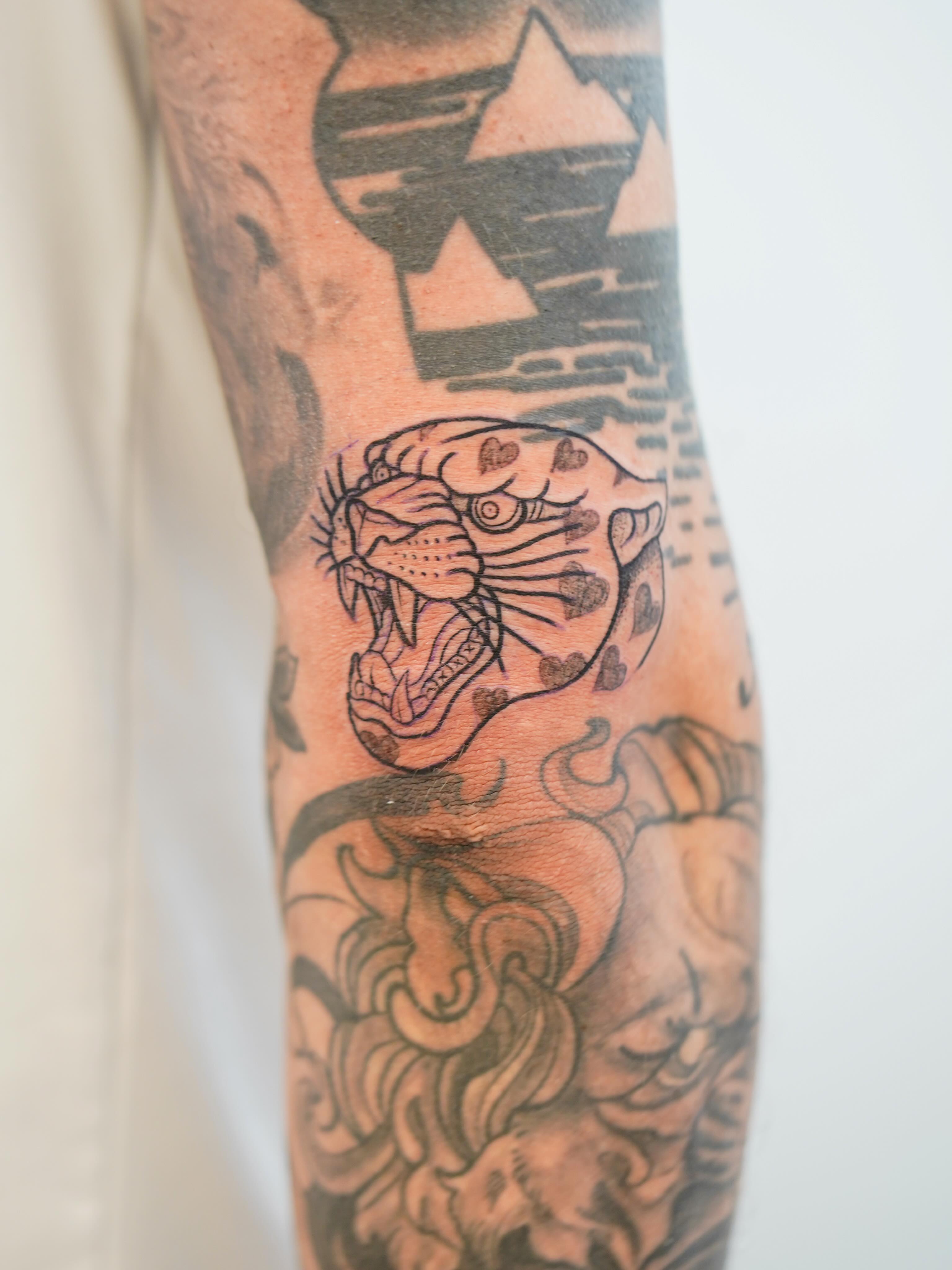 Panther American traditional tattoo on the forearm by Skylar