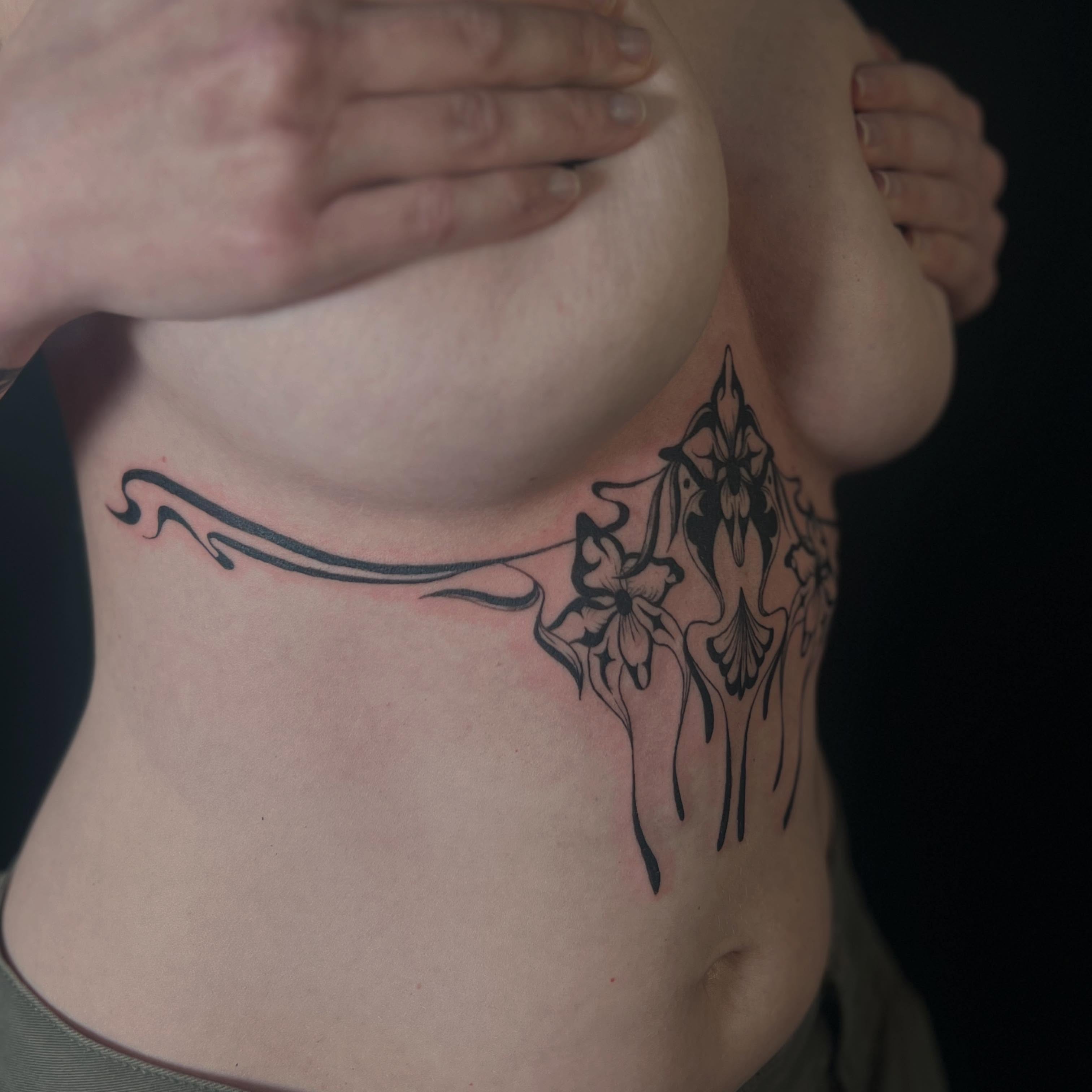 Floral design black and grey tattoo on the neck by Alex