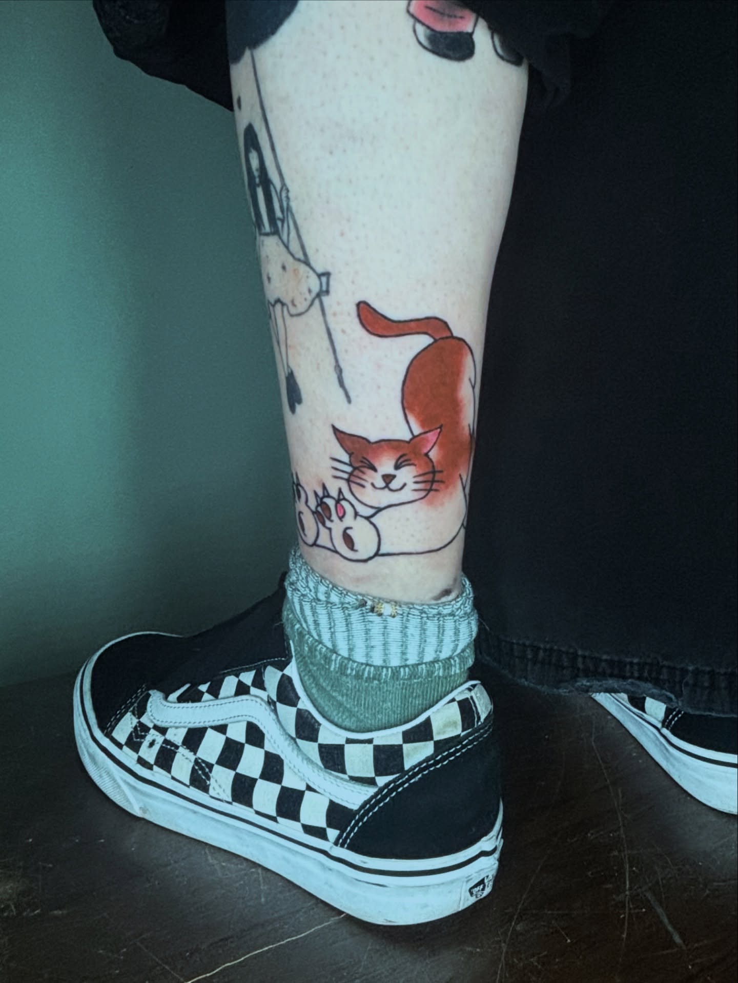 Cat and unicorn dotwork tattoo on the calf by Gabe Rosen