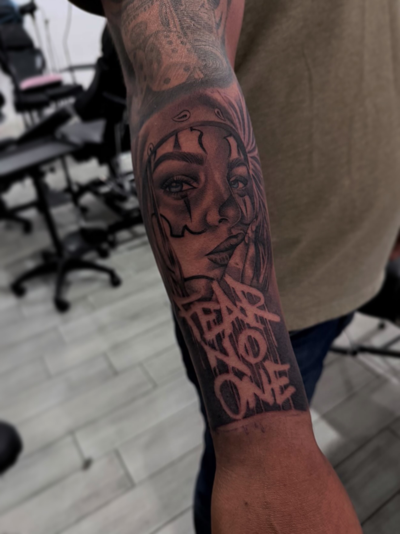 Woman's face realism tattoo on the forearm by Espi