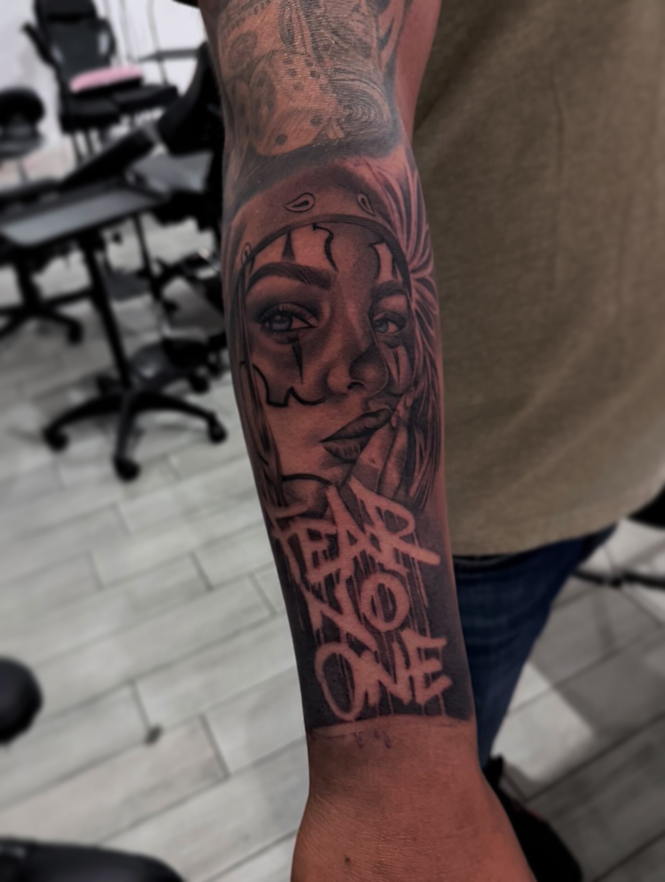 Woman's face realism tattoo on the forearm by Espi