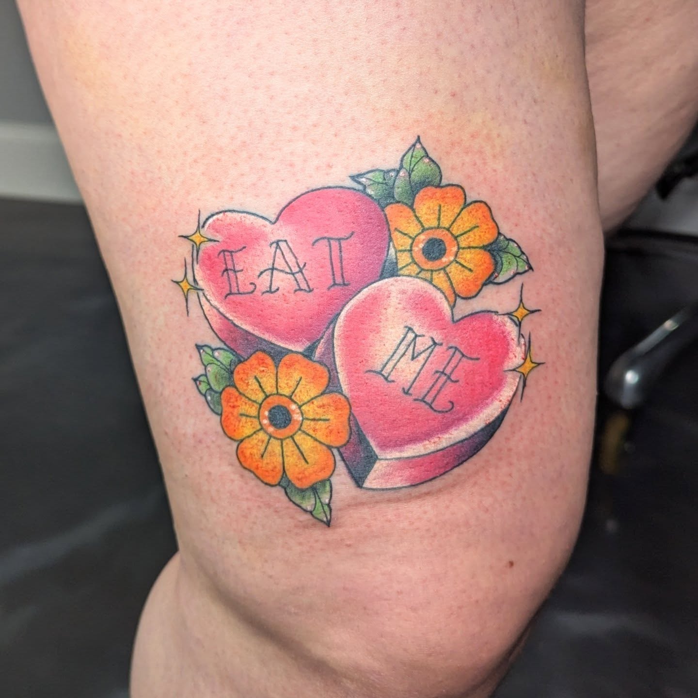 Heart-shaped candy American traditional tattoo on the thigh by Nico Capriotti ๐ณ๏ธโ๐