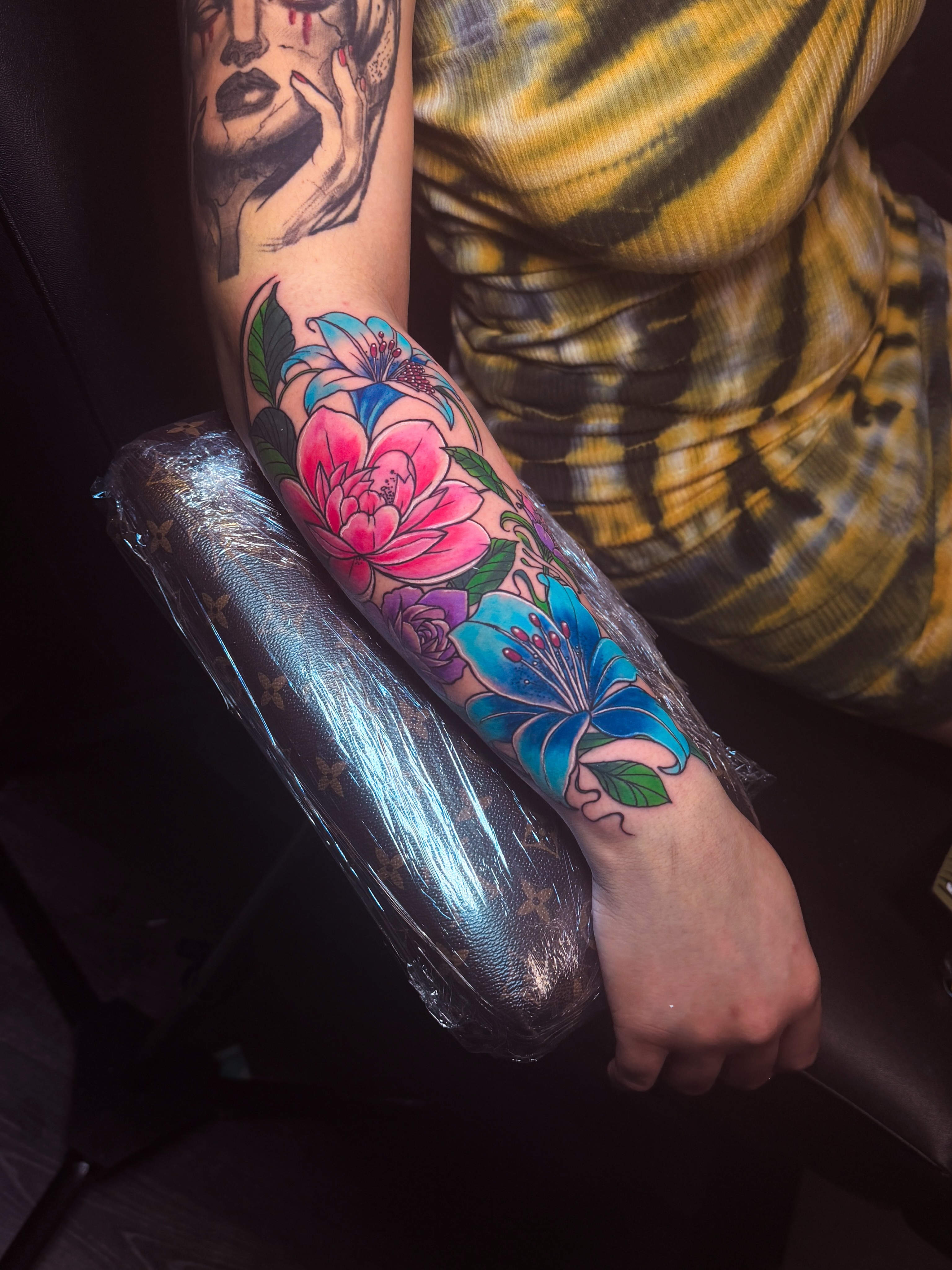 Floral bouquet American traditional tattoo on the forearm by Emac, Baltimore, Maryland