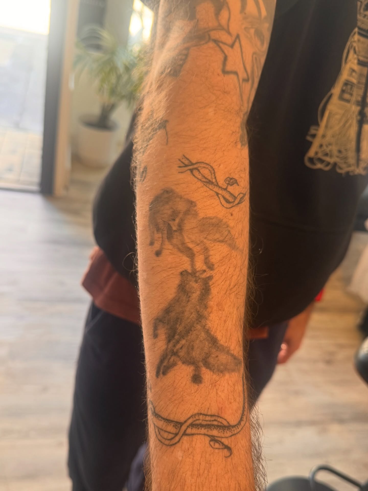 Dancer black and grey tattoo on the forearm by Sam Padilla