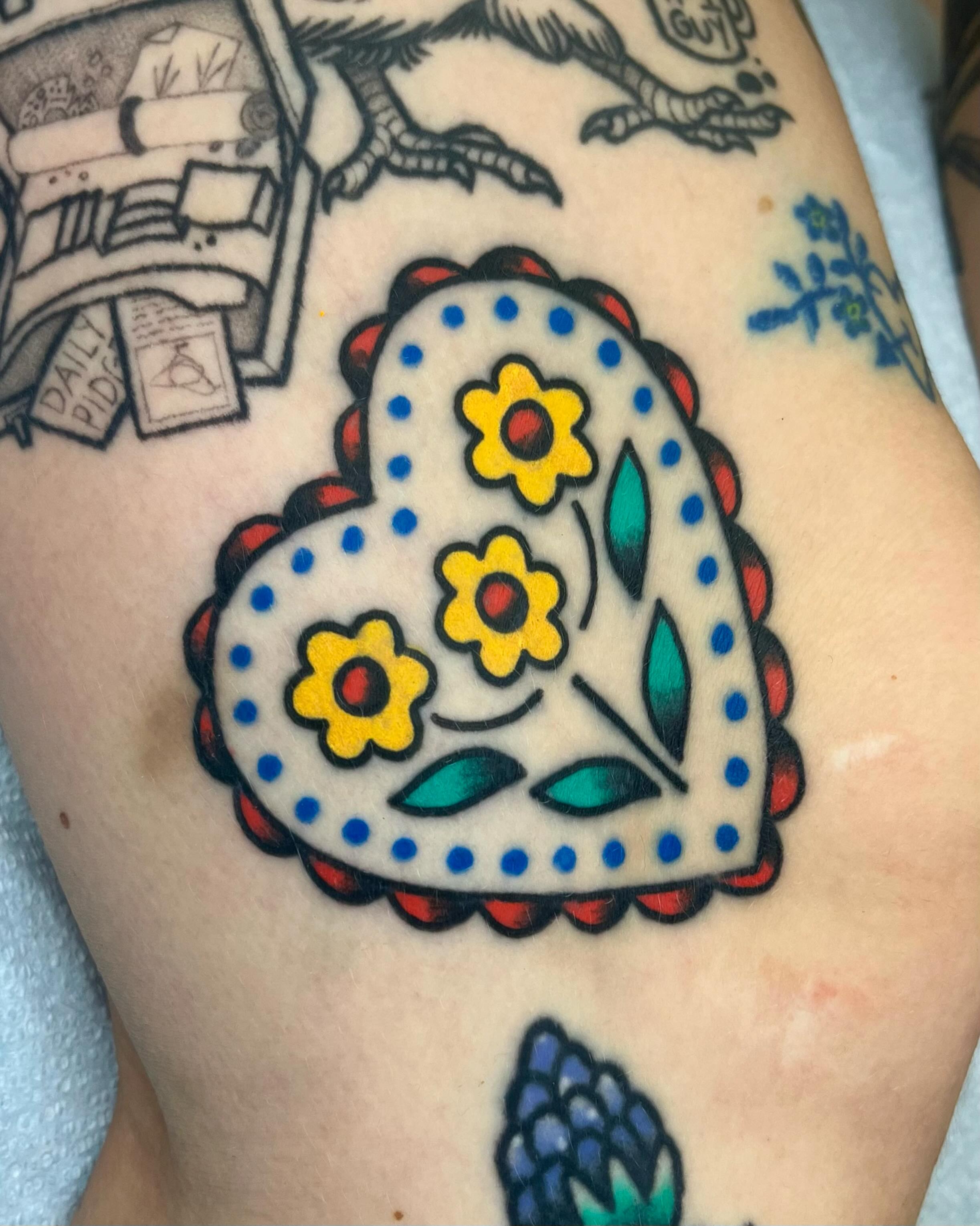 Sugar skull American traditional tattoo on the thigh by Em Adkins