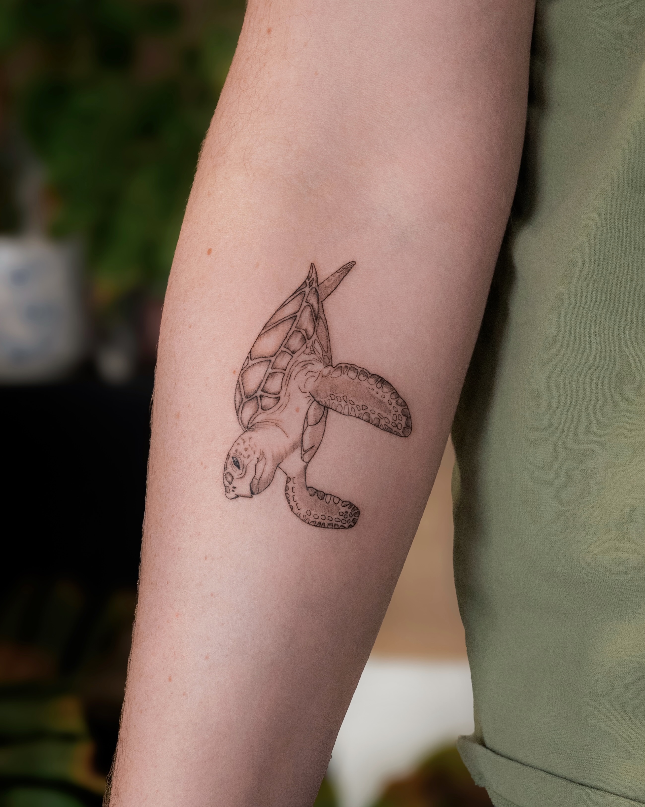 Sea turtle black and grey tattoo on the forearm by Ash - Fineline Tattoo Apprentice