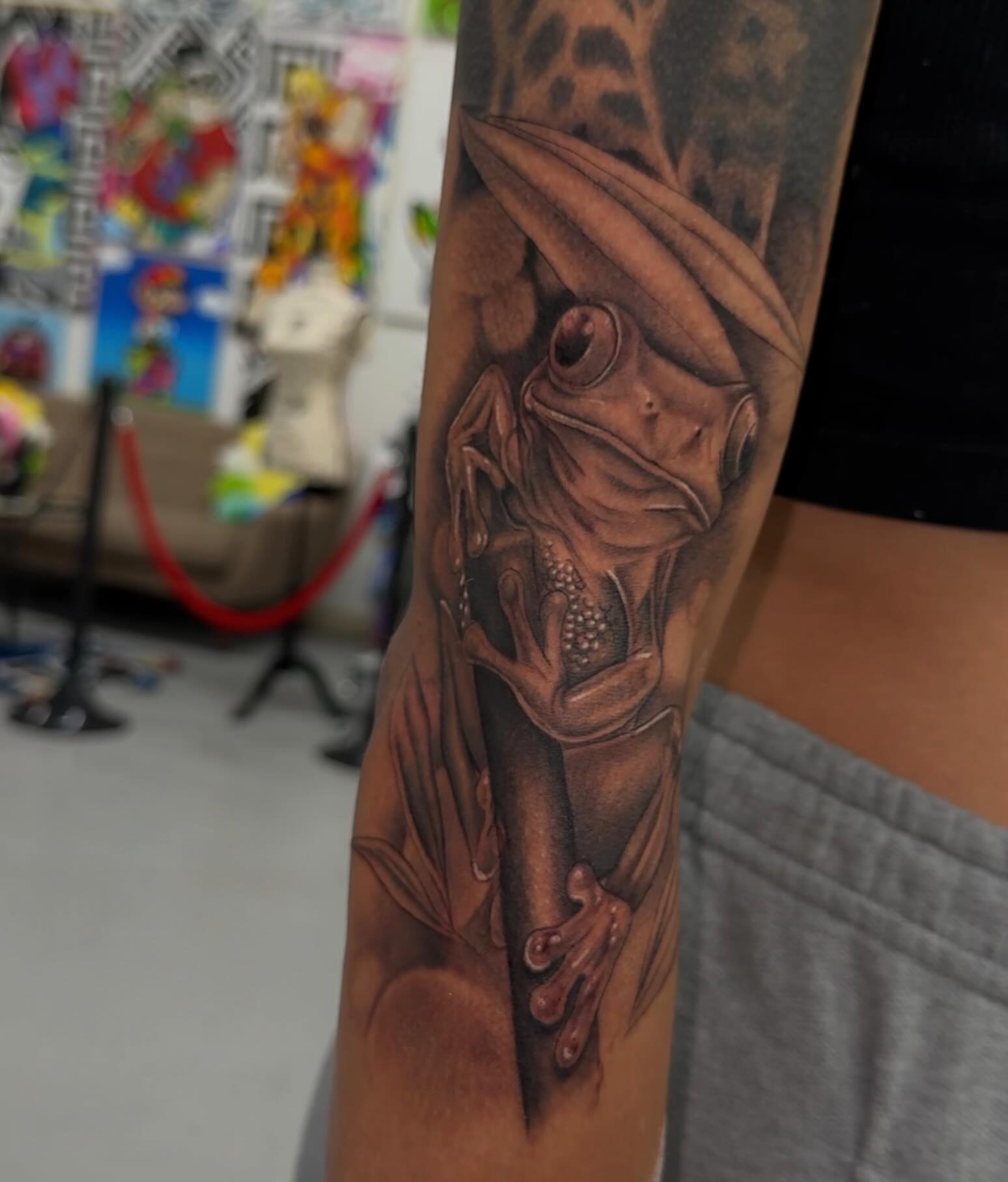 Frog realism tattoo on the forearm by Serendipity Tattoos