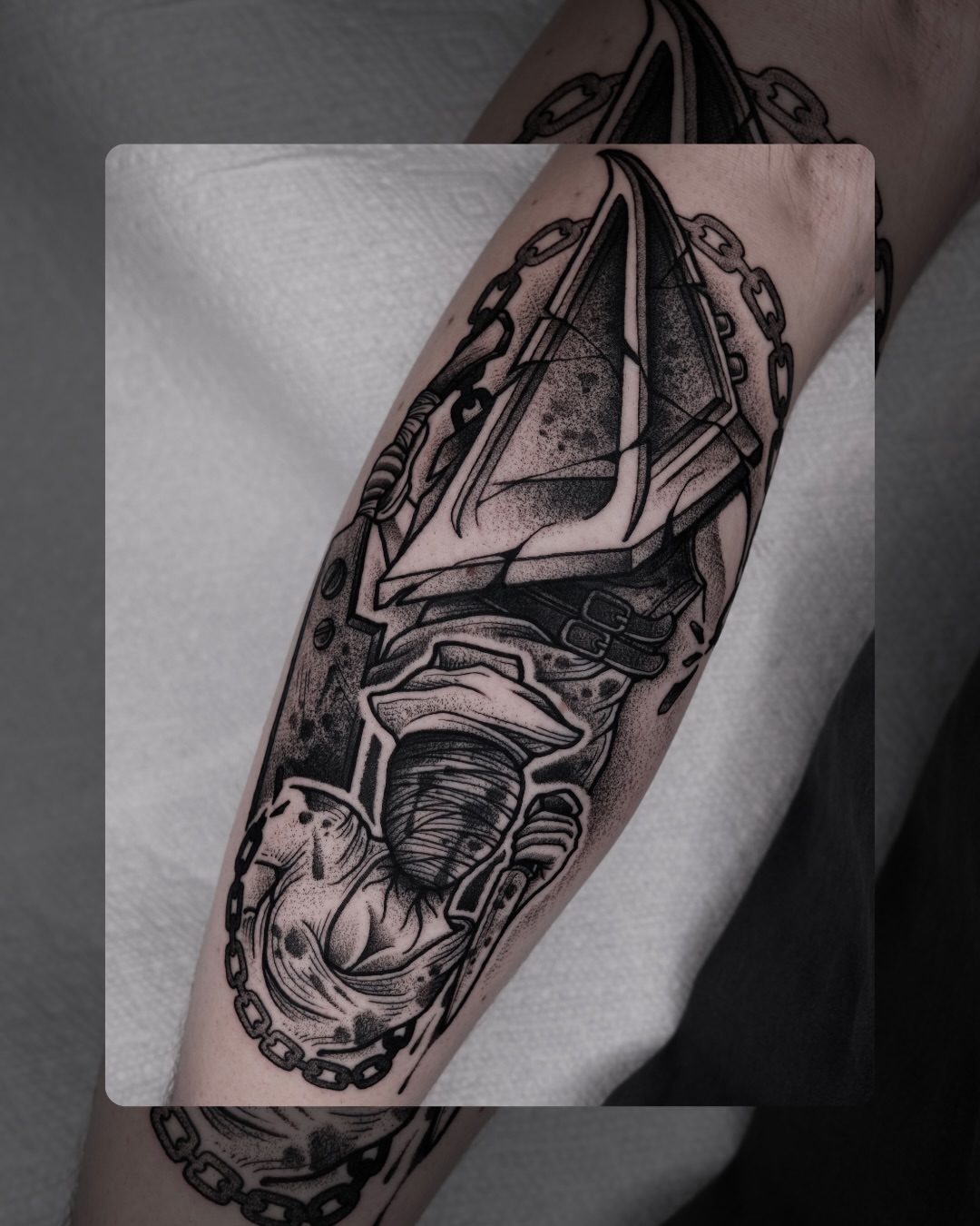 Ship and chains dotwork tattoo on the forearm by Kyle Patrick