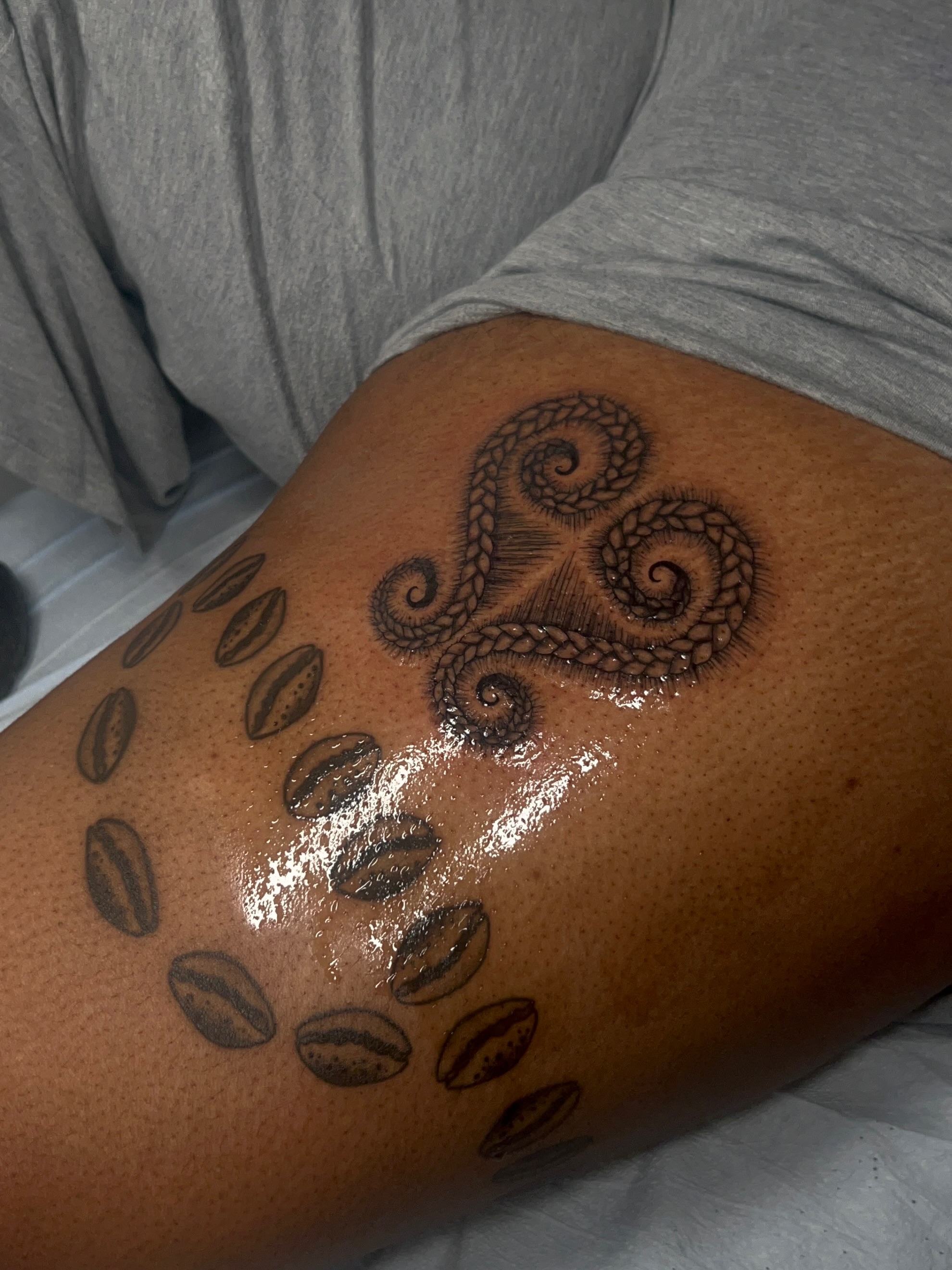 Octopus tentacles black and grey tattoo on the thigh by ༻𝐓𝐡𝐞 𝐒𝐤𝐢𝐧 𝐆𝐚𝐫𝐝𝐞𝐧༺