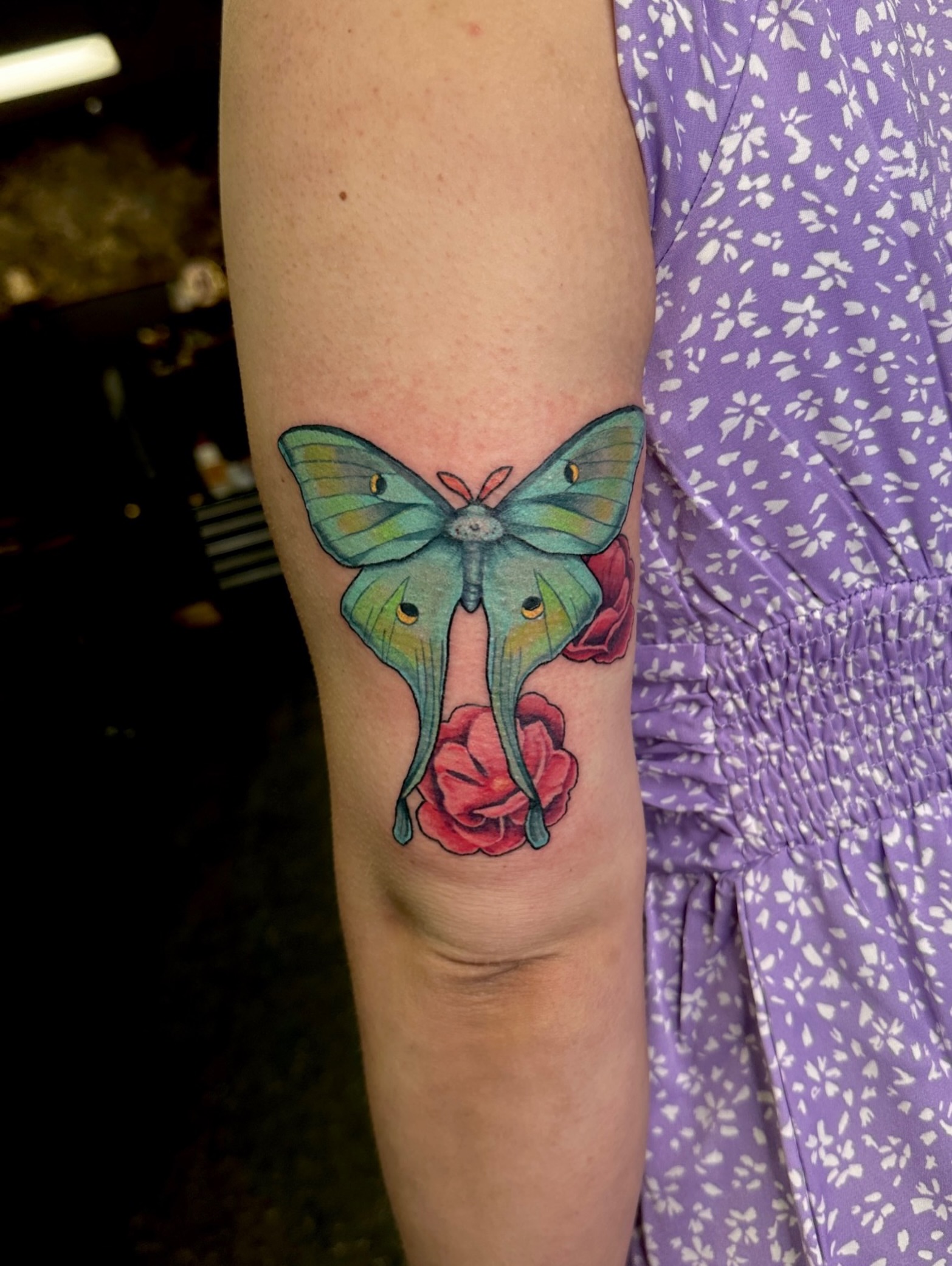 Butterfly and rose new school tattoo on the forearm by Alexandrea Arendell