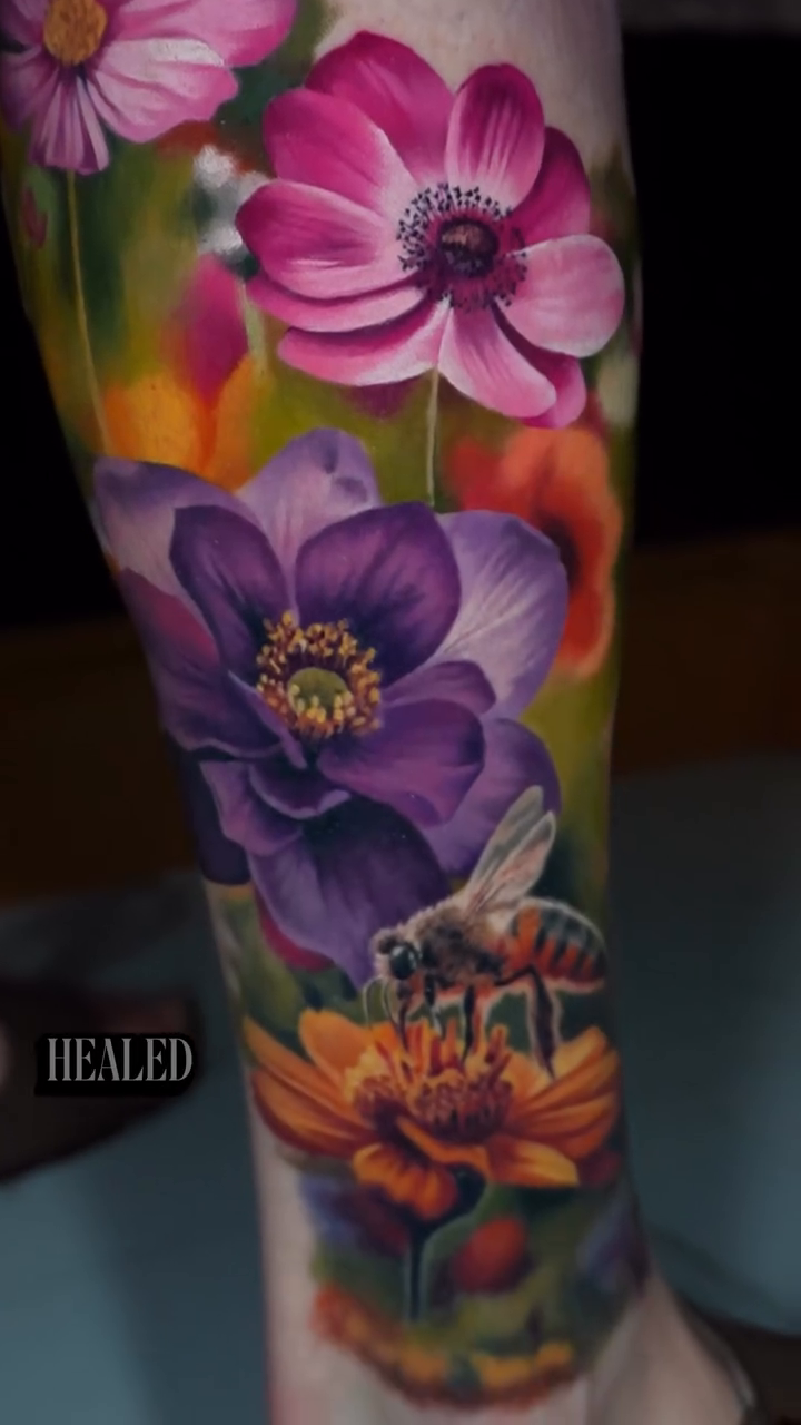 Flowers and a bee realism tattoo by color realism tattoos by gela✨