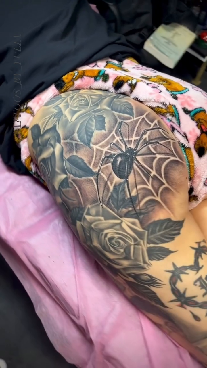 Roses and spiderweb tattoo blackwork tattoo on the forearm by Yulia Chekir, Chicago, Illinois