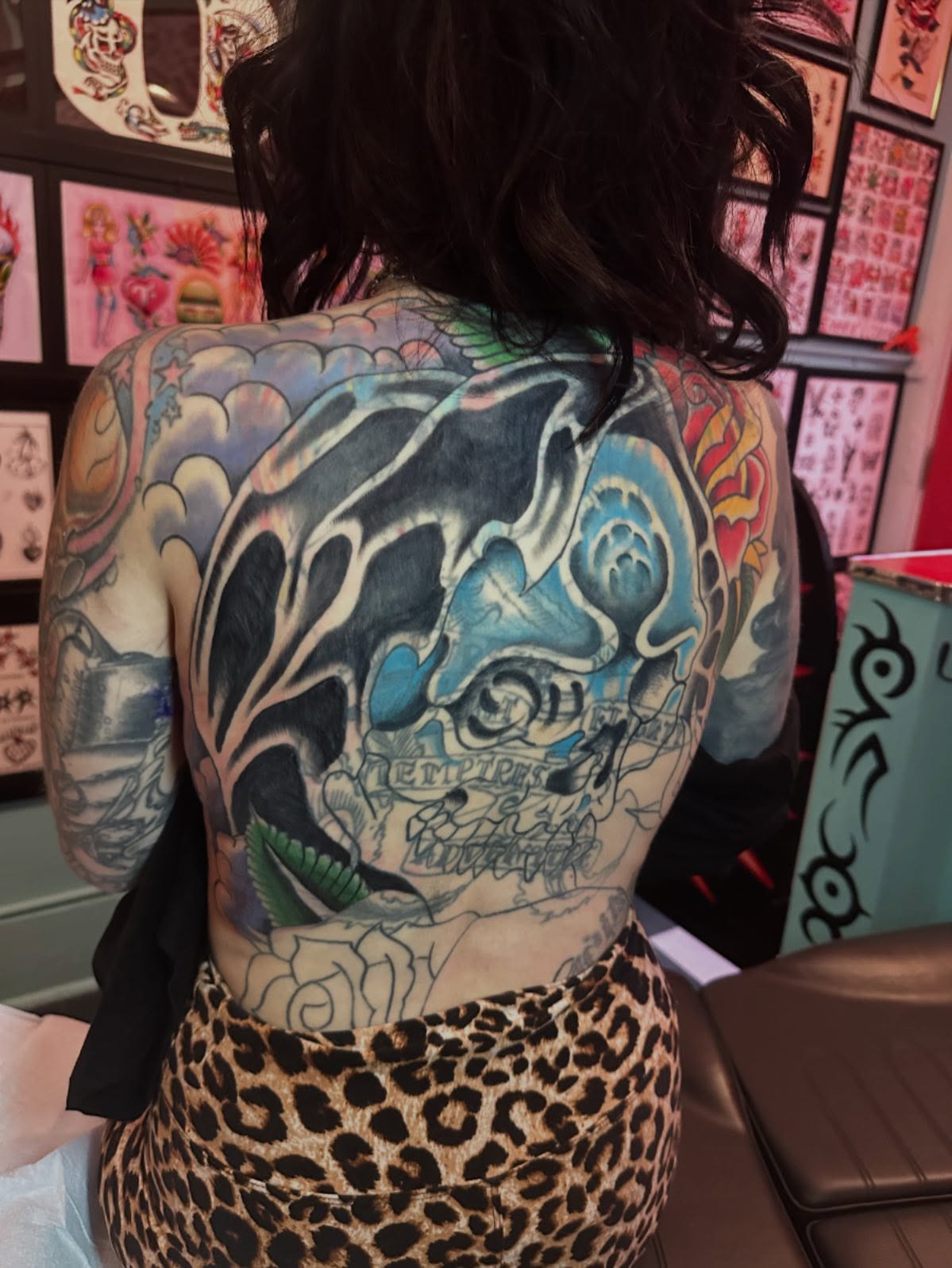 Skull American traditional tattoo on the back by Chris Bishop