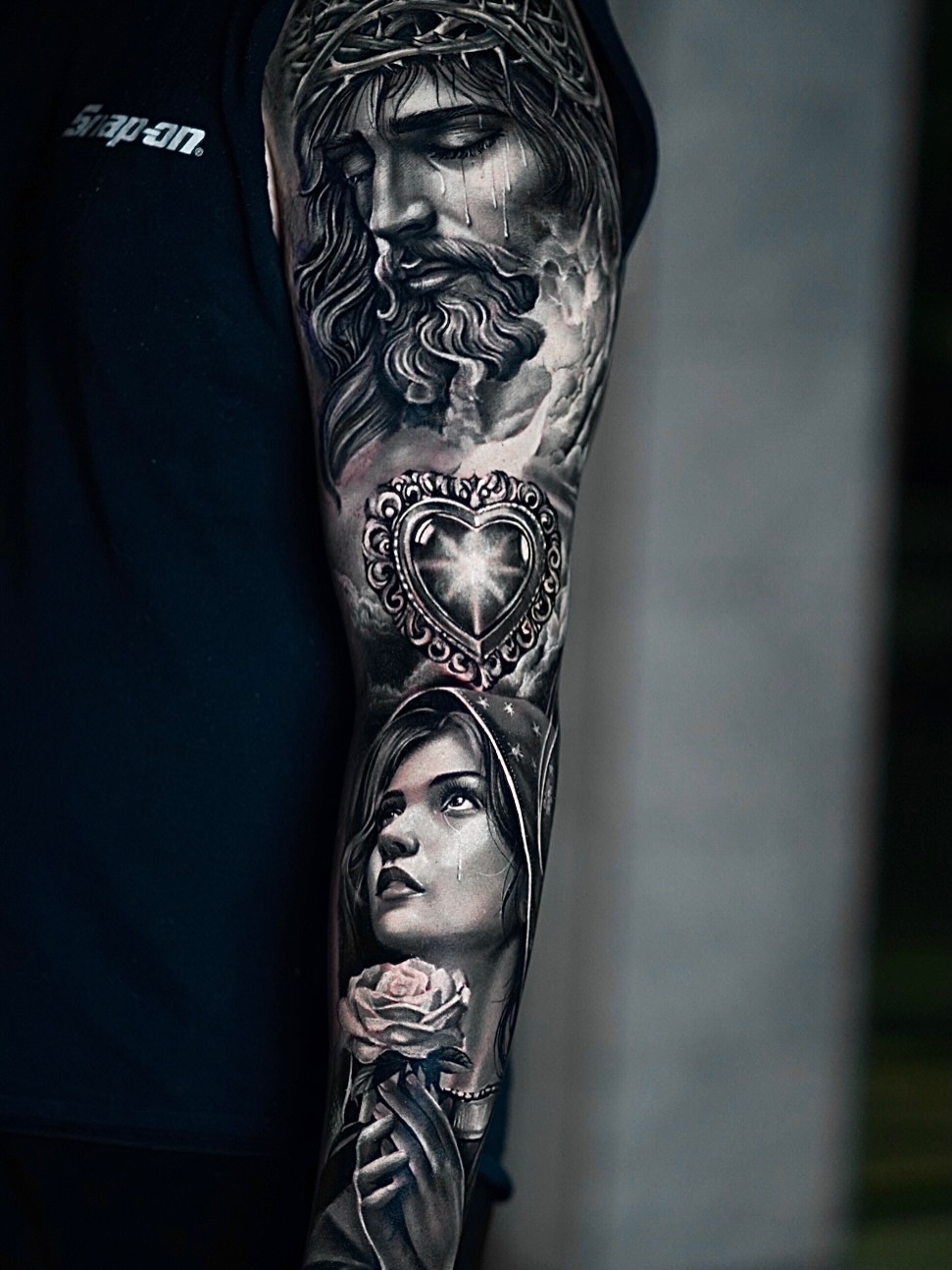 Tattoo by @rann_tattoo — realism, black_and_grey