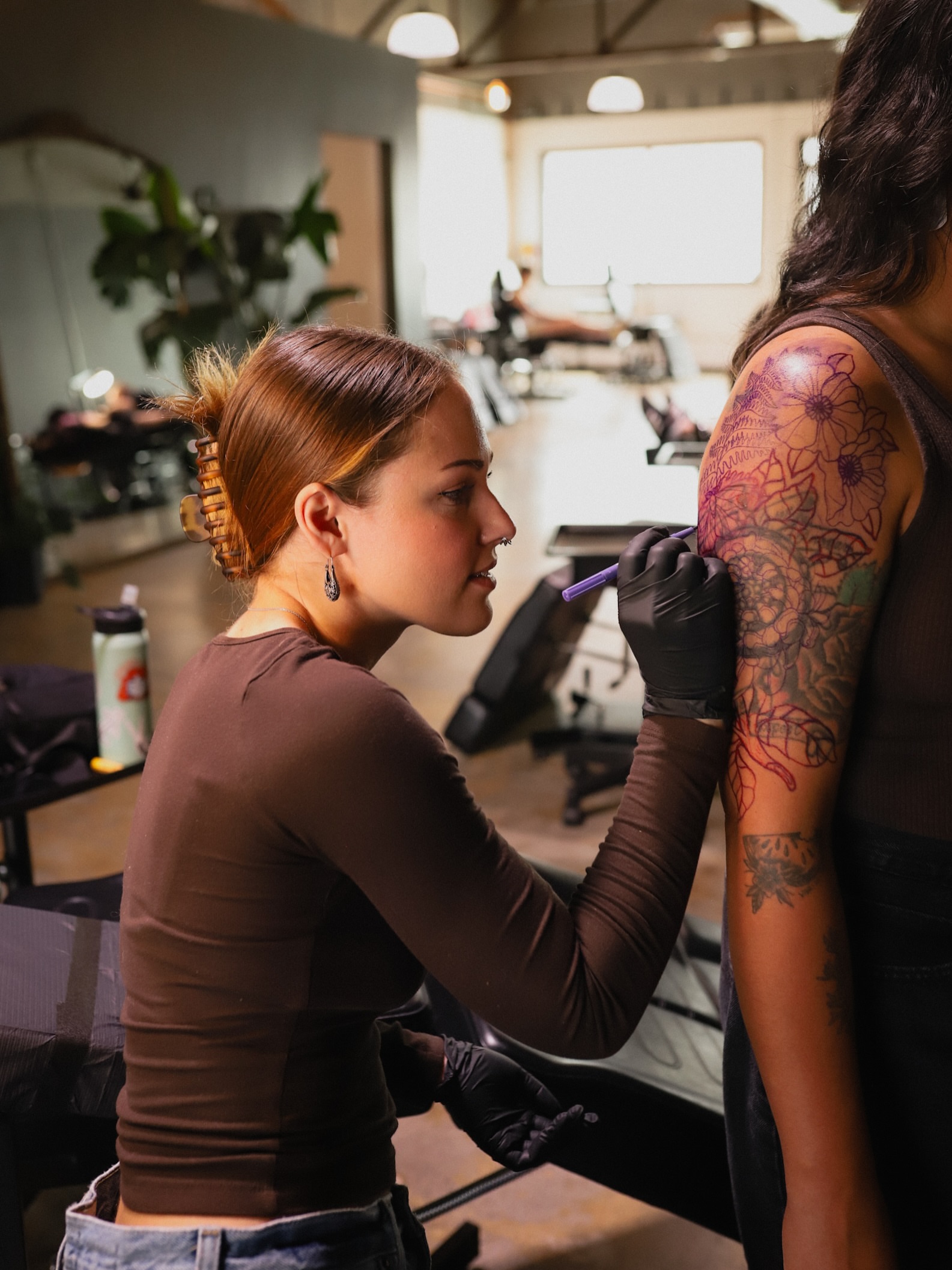 Floral design new school tattoo on the shoulder by Salt Lake City tattoo artist