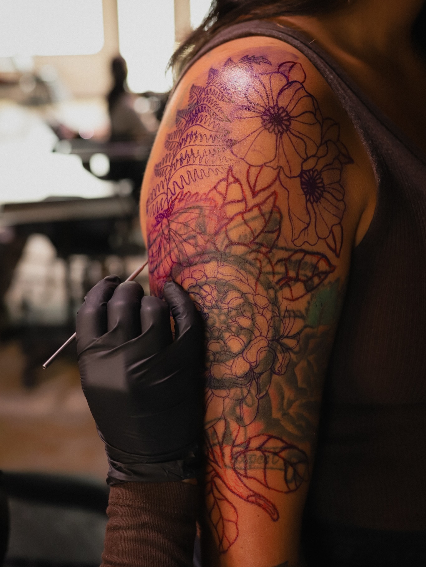 Floral design fine line tattoo on the shoulder by Salt Lake City tattoo artist